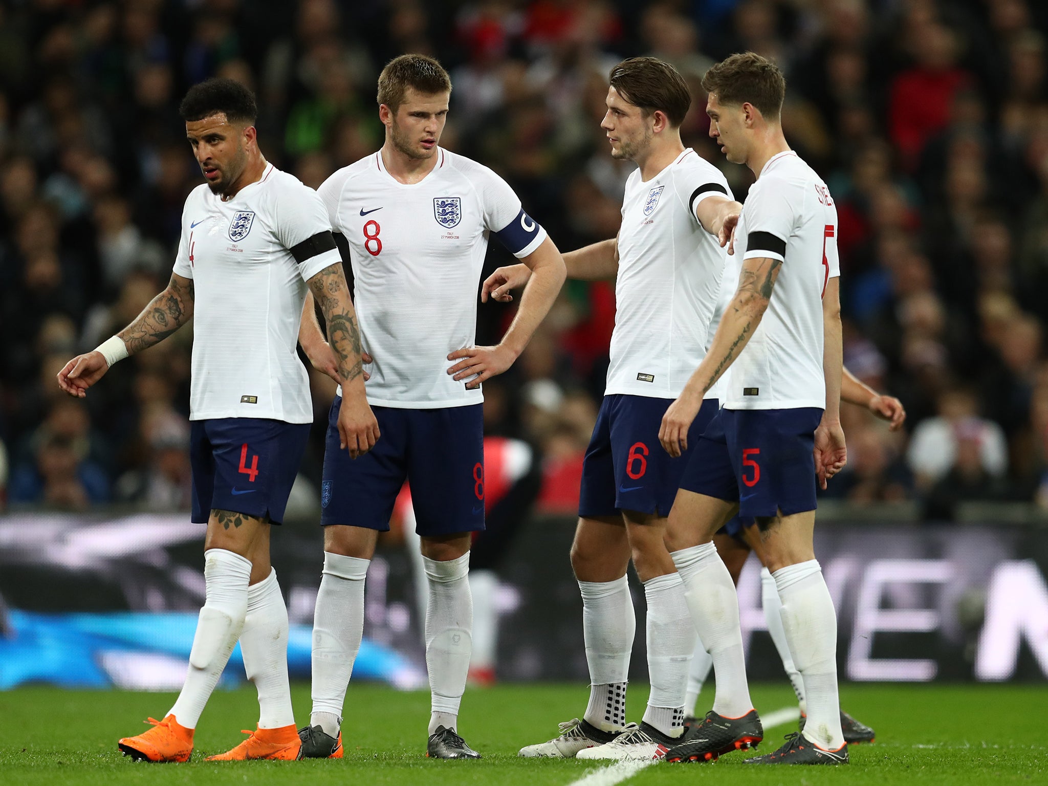 James Tarkowski (second right) conceded a penalty on his England debut