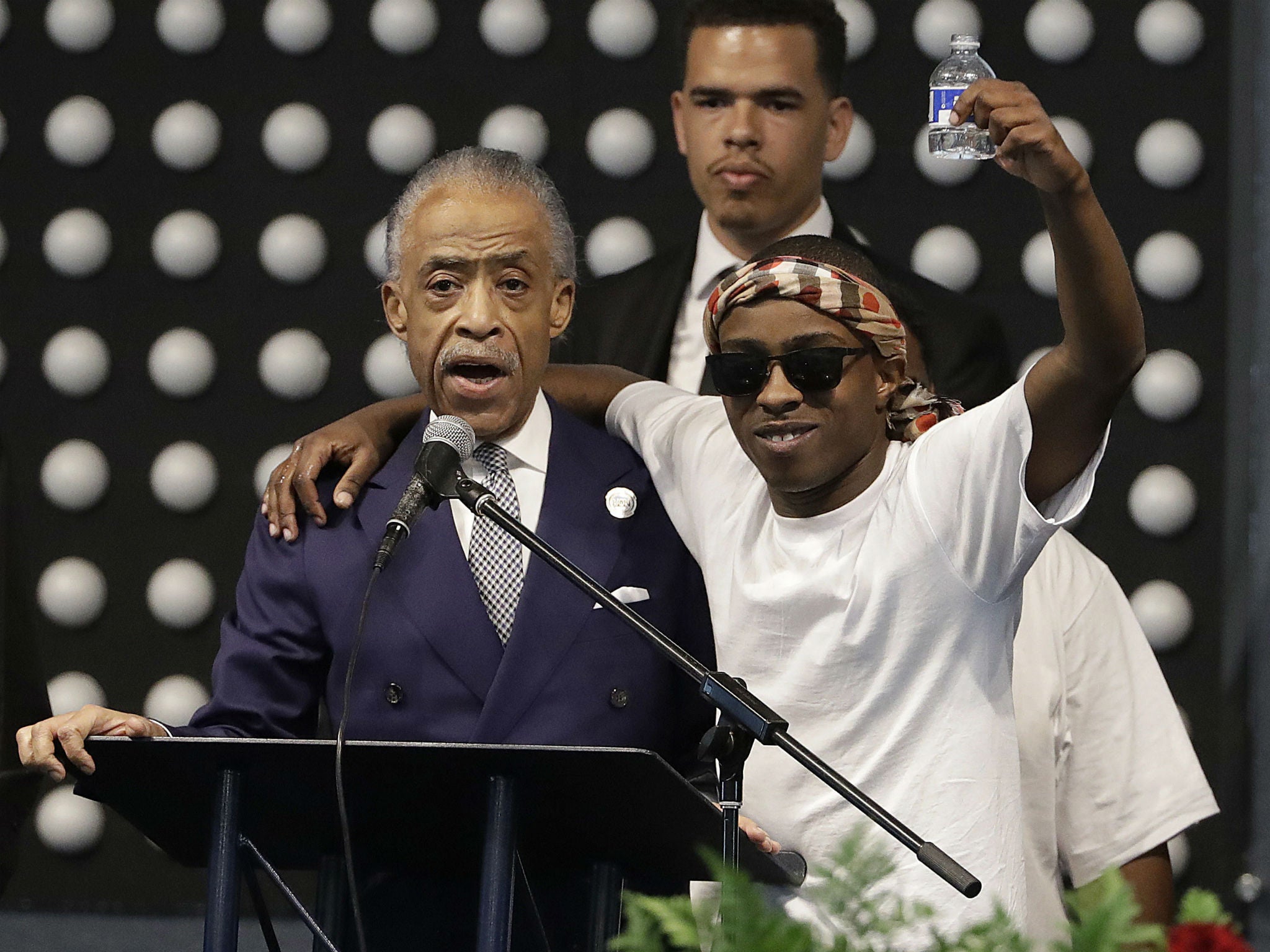 Reverend Al Sharpton with Stevante Clark during the funeral services for Stephon Clark, Stevante's brother, in Sacramento, California