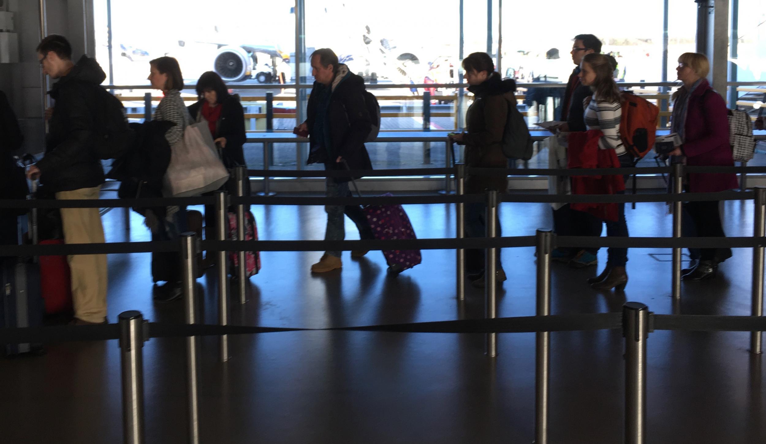 Departing soon? Passengers queuing at Stansted Airport