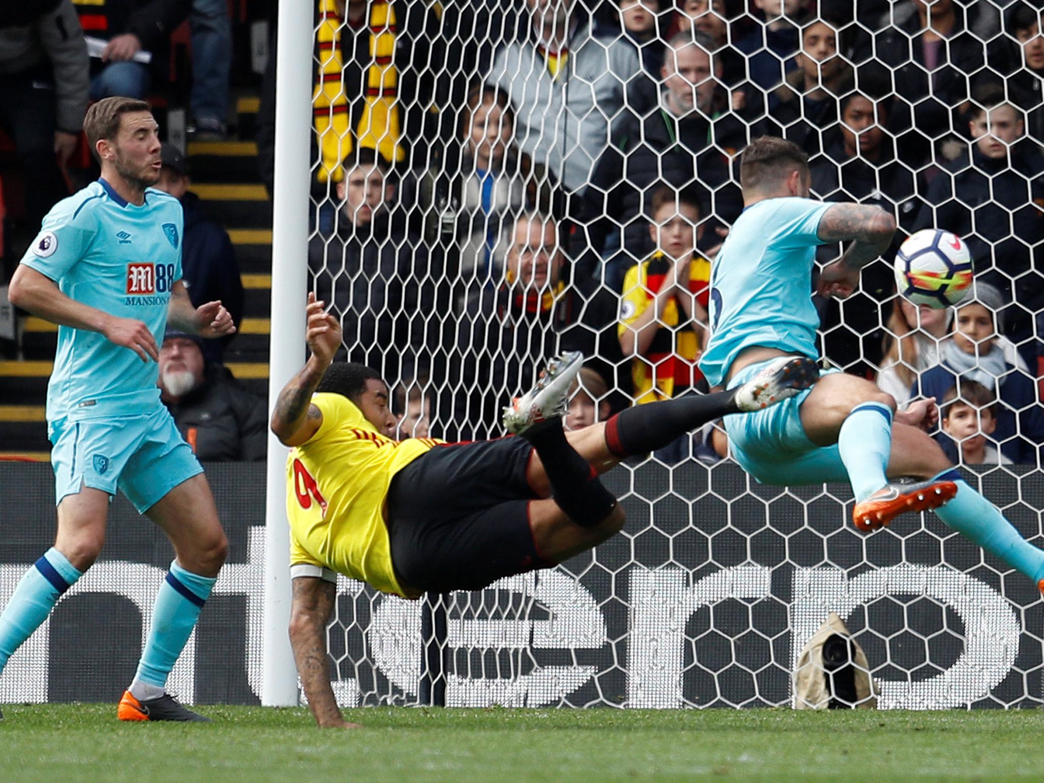 Troy Deeney takes a shot on goal for Watford