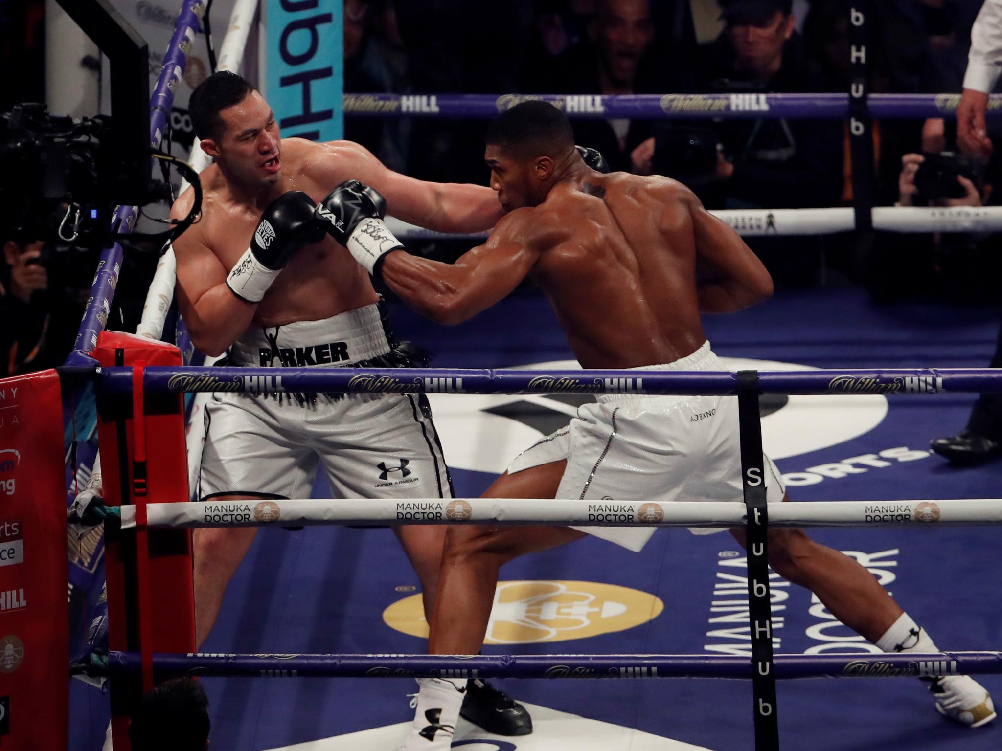 The crowd has quietened slightly this round as they look to be given something to cheer about. Joshua twice obliges with shots at Parker up against the ropes. There is an accidental head clash that throws the Briton slightly towards the end of the round that the referee warns both about but Joshua is still on top. Just. 
<br/>LB: Joshua 10-9 Parker
<br/>JA: Joshua 10-9 Parker
<br/>JDM: Joshua 10-9 Parker