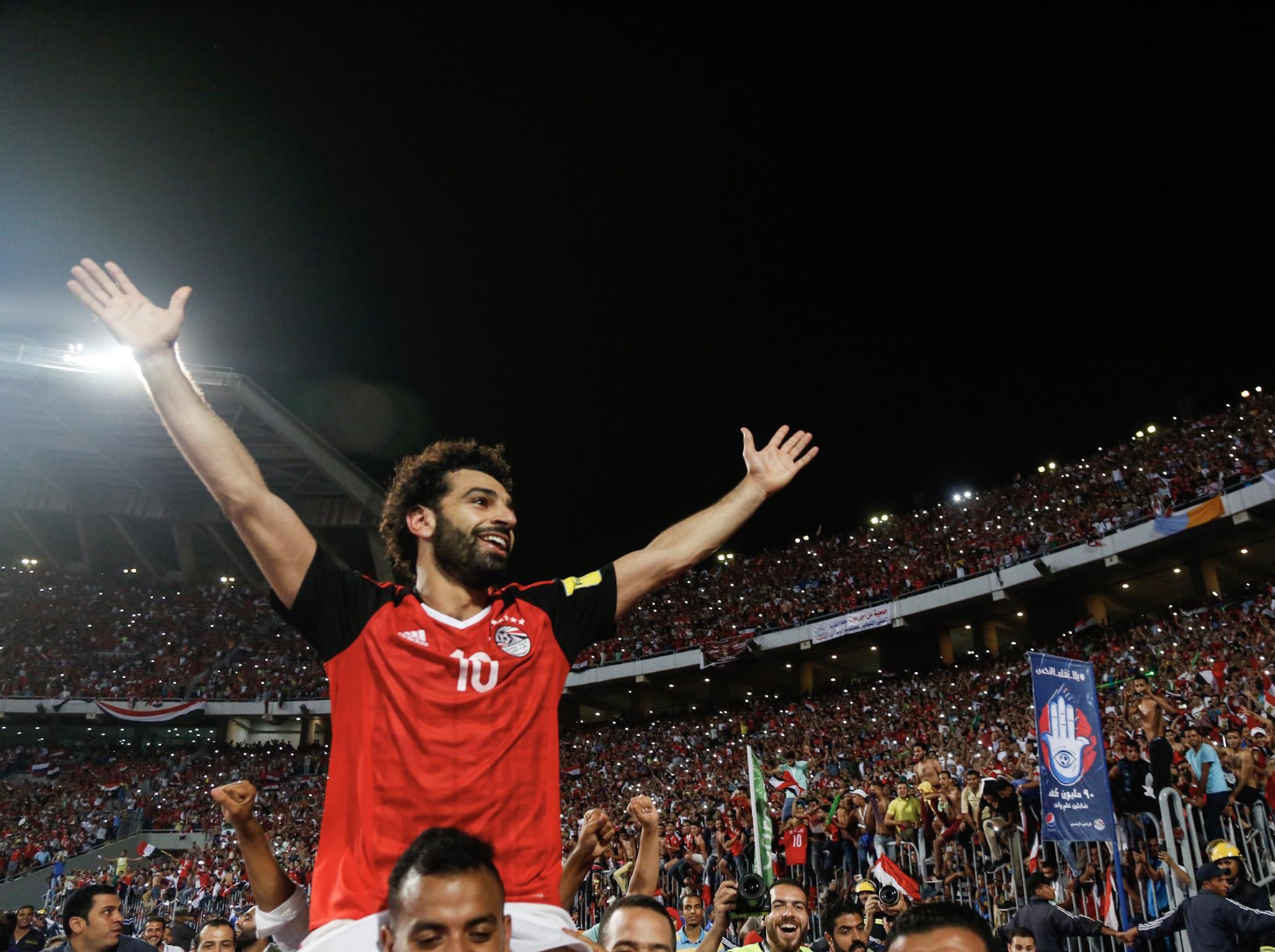 Mohamed Salah celebrates qualifying for the World Cup