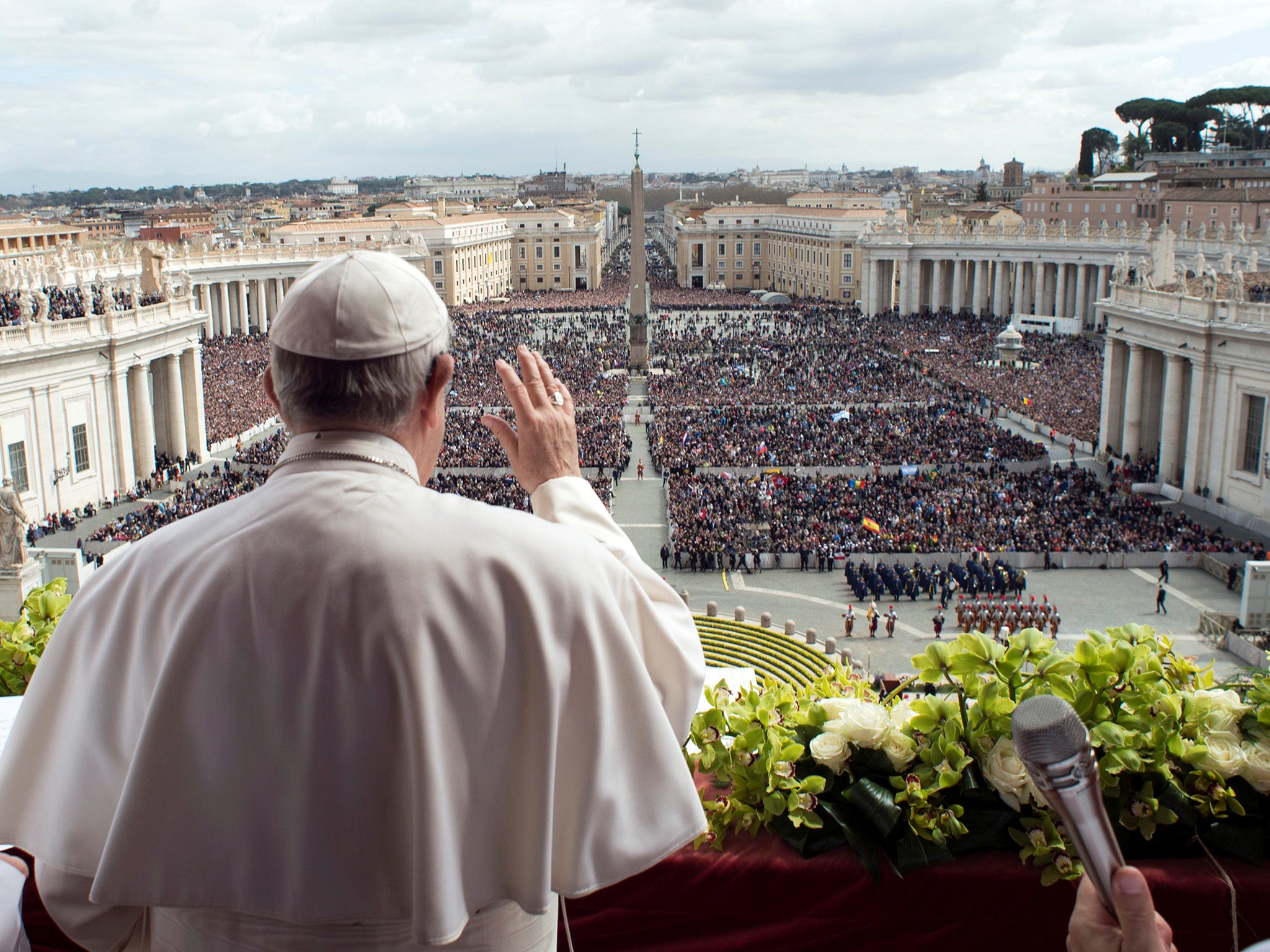 Pope Francis appears before the crowd in St Peter’s Square on Easter Sunday