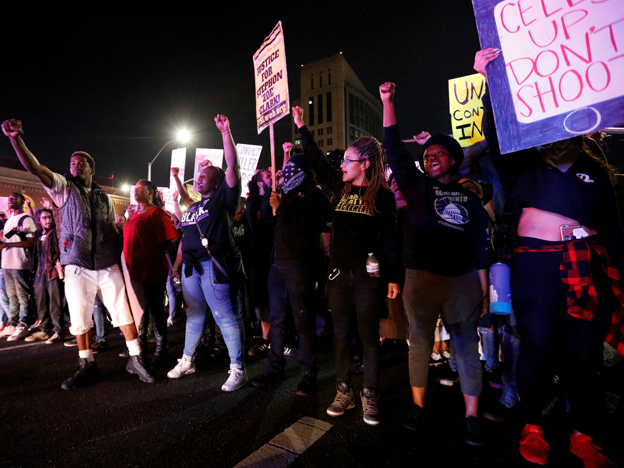 Demonstrators protest the police shooting of Stephon Clark, in Sacramento, California