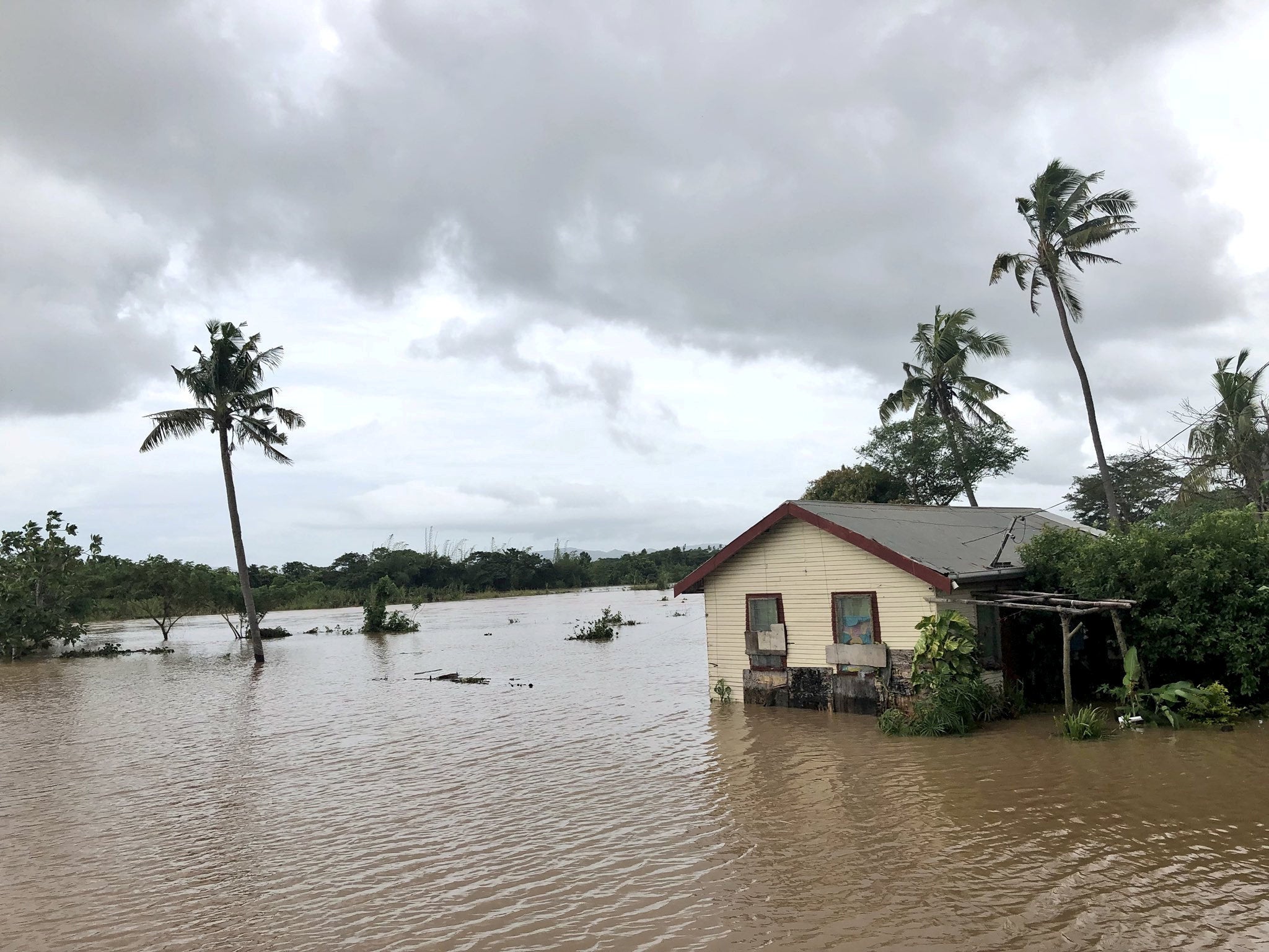 Floodwater from tropical Cyclone Josie in Nailaga Village, Ba, Fiji. Four people have been killed and the storm has caused widespread damage on the islands