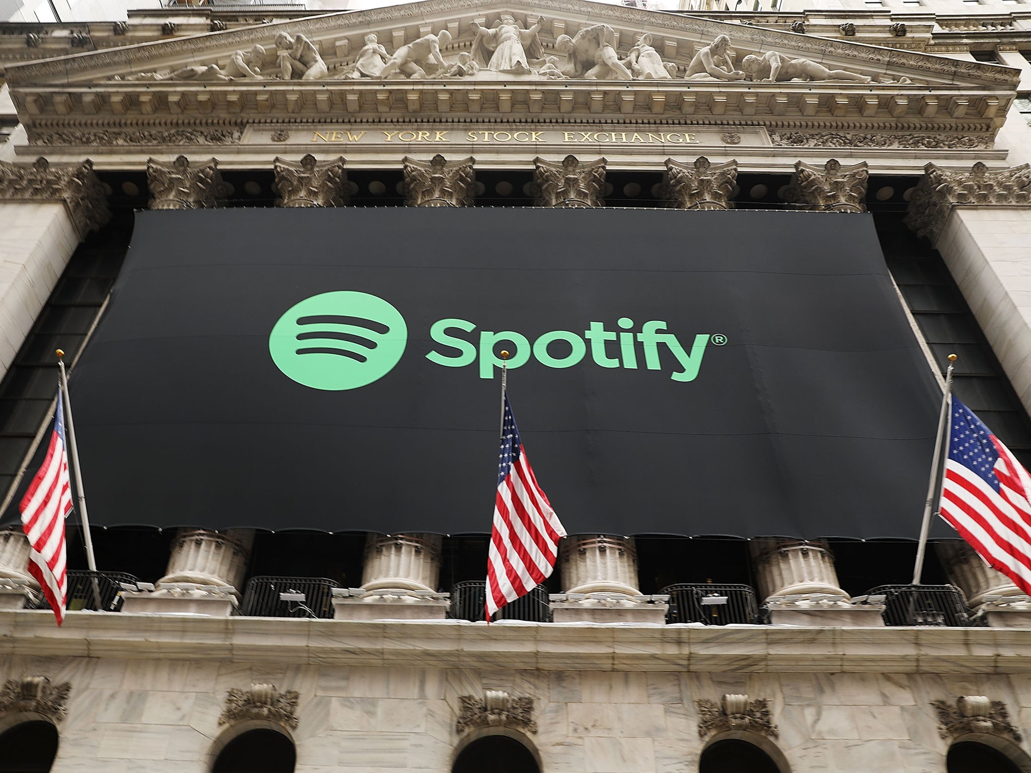 The Spotify banner hangs from the New York Stock Exchange