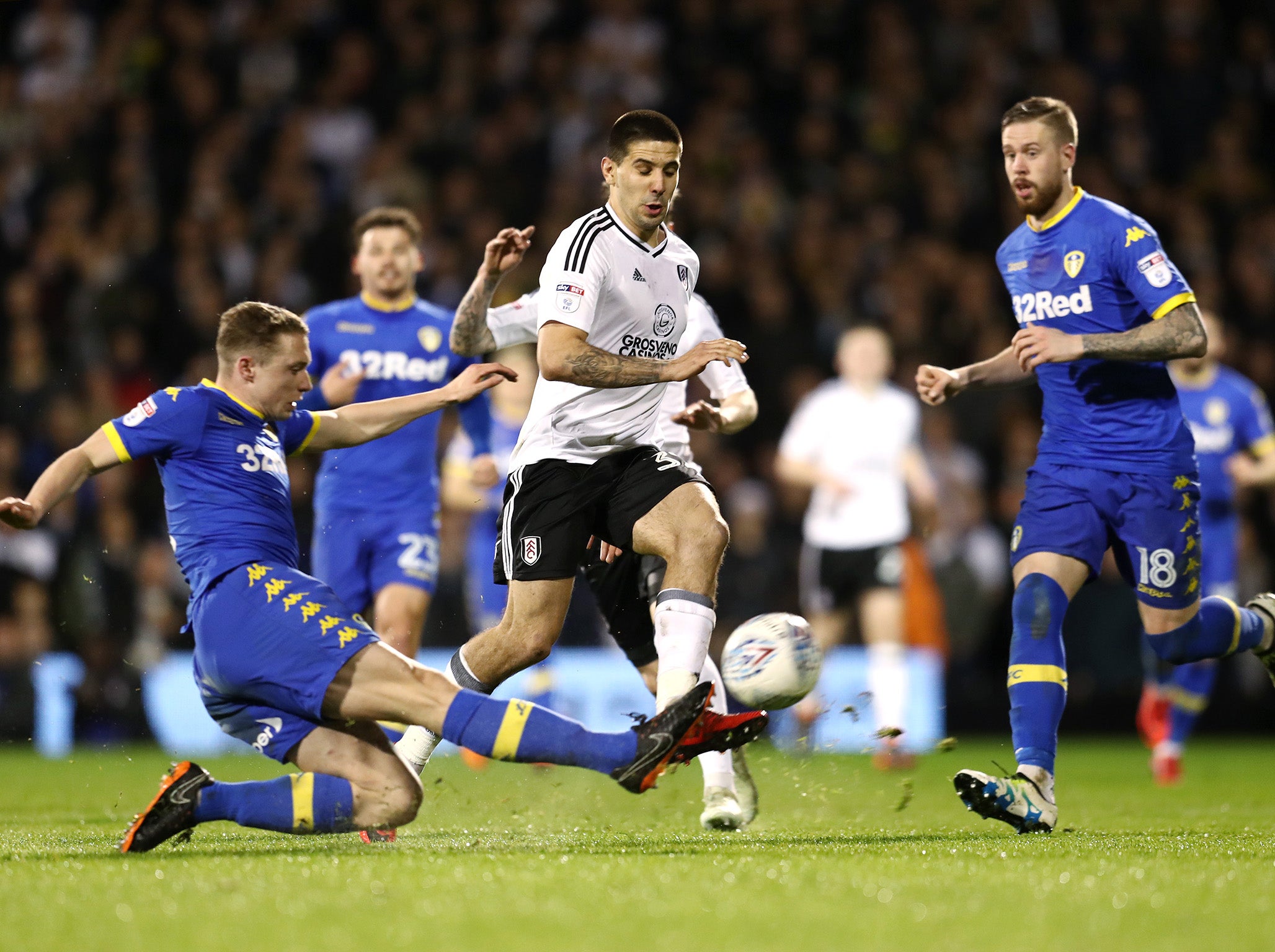 Matthew Pennington slides in for a tackle