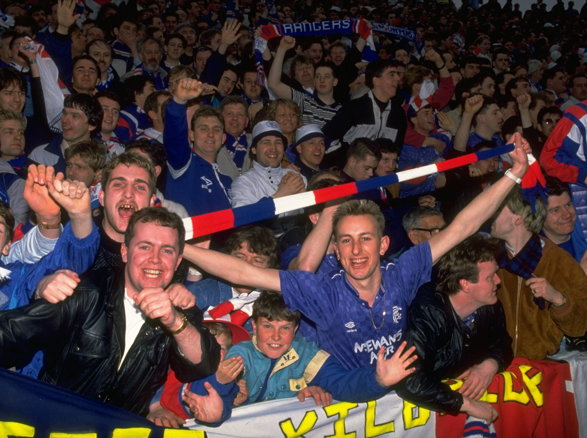 Rangers supporters celebrating their famous win