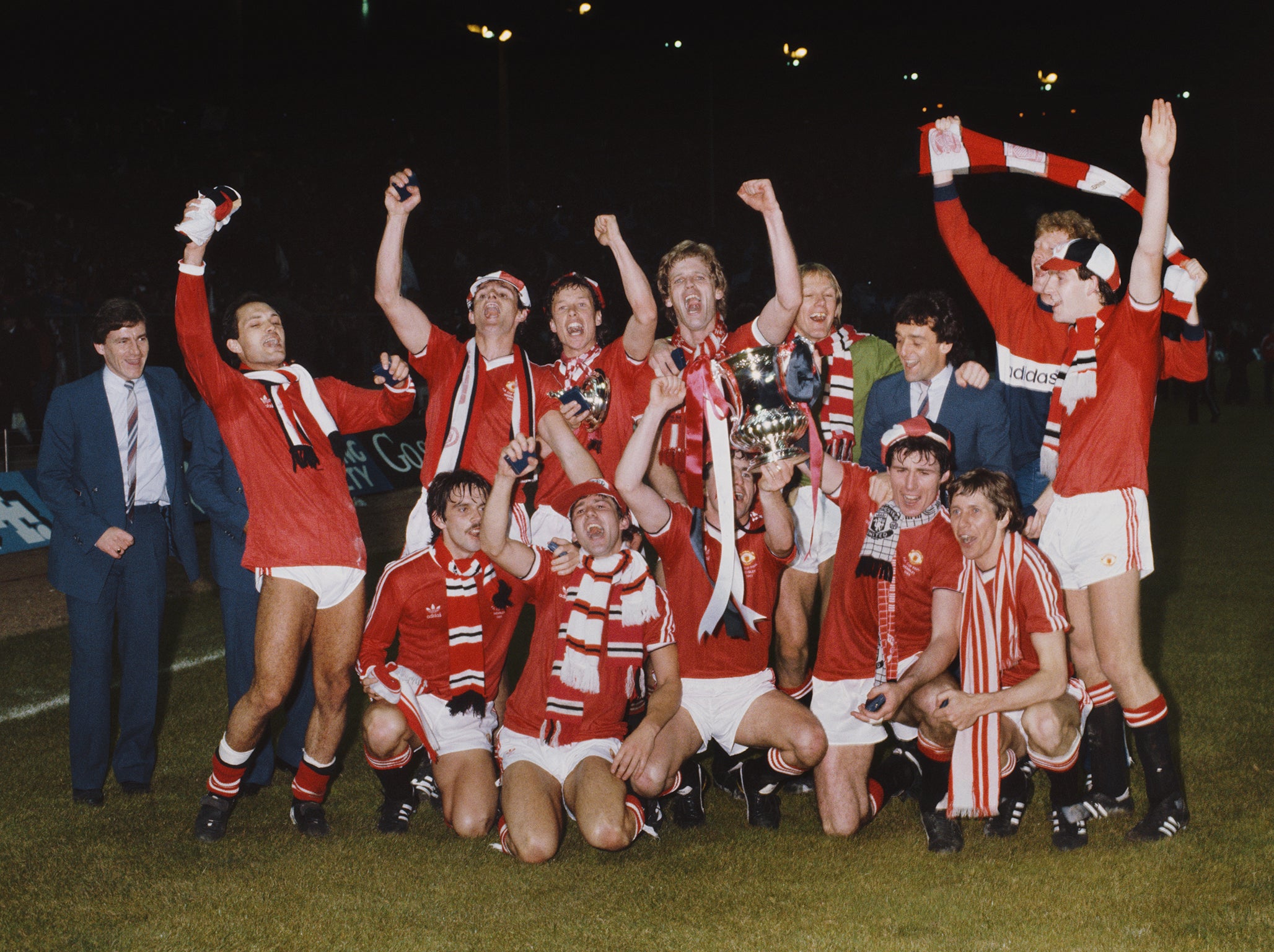 Wilkins (back row, second left) celebrates with his team-mates