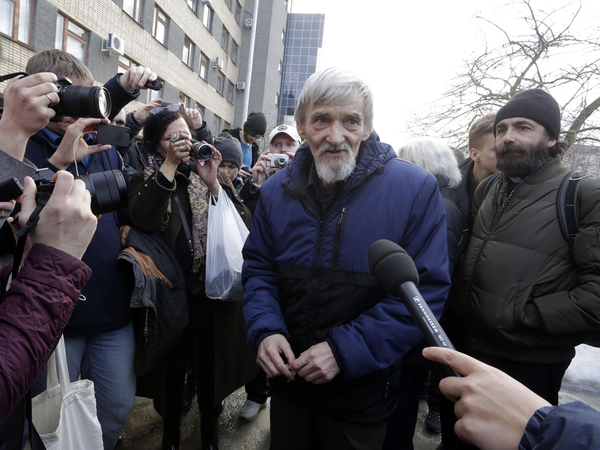 Russian historian Yuri Dmitriyev leaves court in the city of Petrozavodsk, in the northwest of Russia