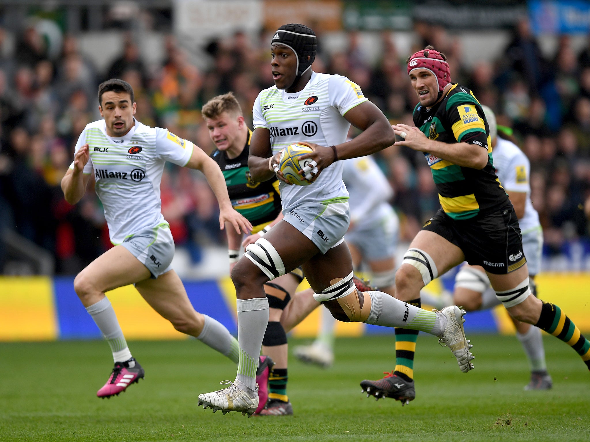 Maro Itoje takes the ball upfield during Saracens' rout of Northampton