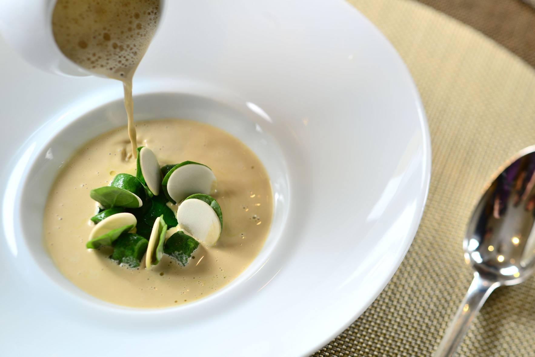 Epure's signature White Button Mushroom Soup with Baby Spinach Gnocchi