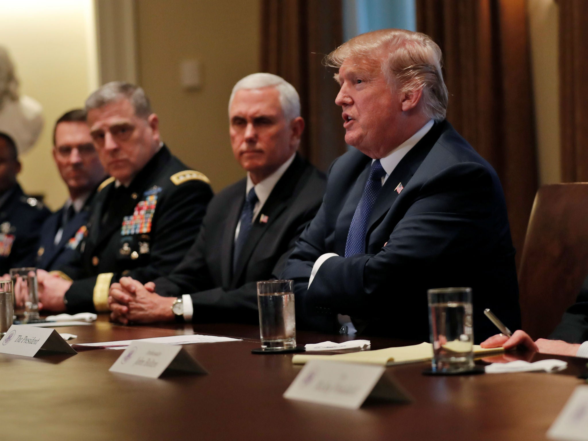 Donald Trump with Mike Pence ahead of a meeting with US military officials