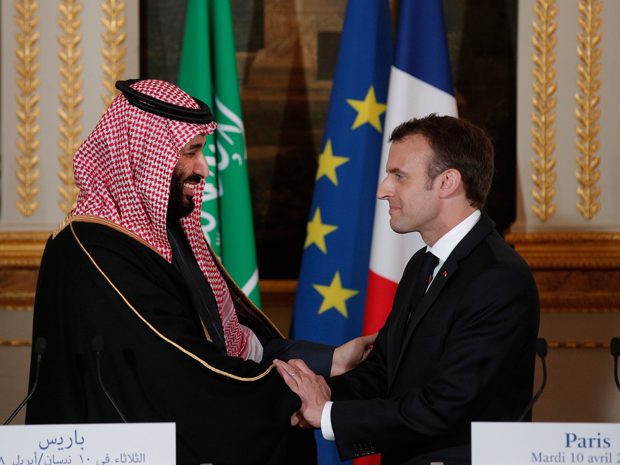 Emmanuel Macron and Saudi Arabia Crown Prince Mohammed bin Salman attend a press conference at the Elysee Palace in Paris