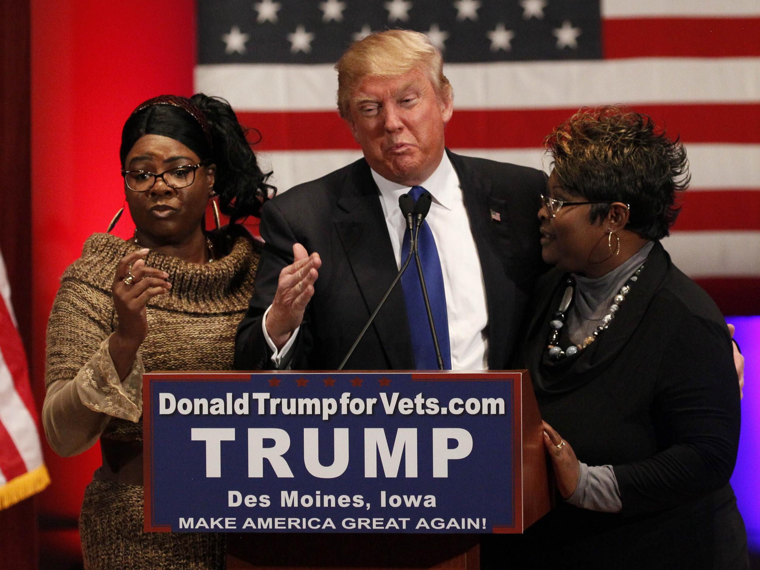 Diamond and Silk with Donald Trump on the campaign trail in Des Moines, Iowa, on 28 January 28 2016