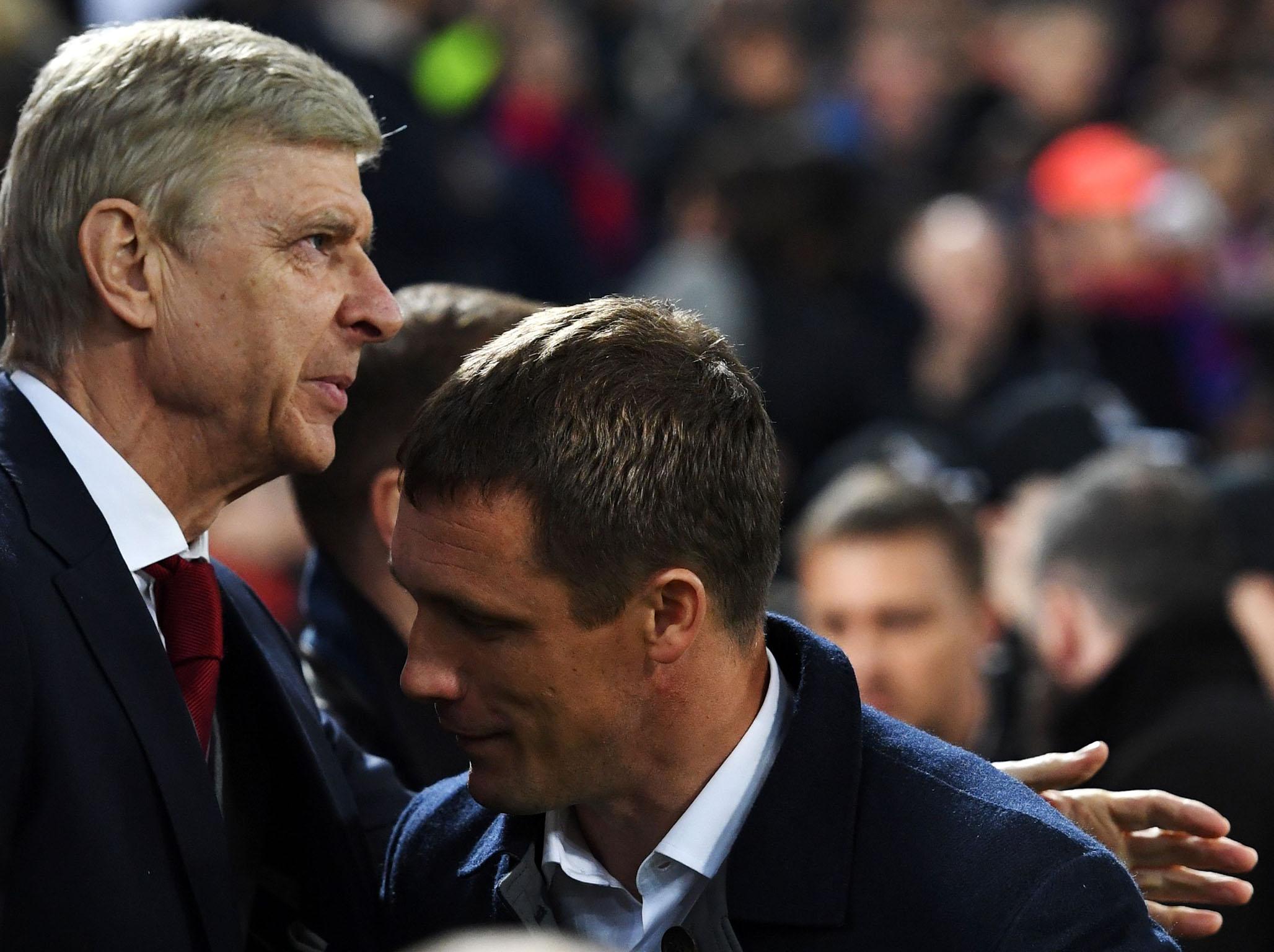 Arsene Wenger and CSKA manager Viktor Goncharenko