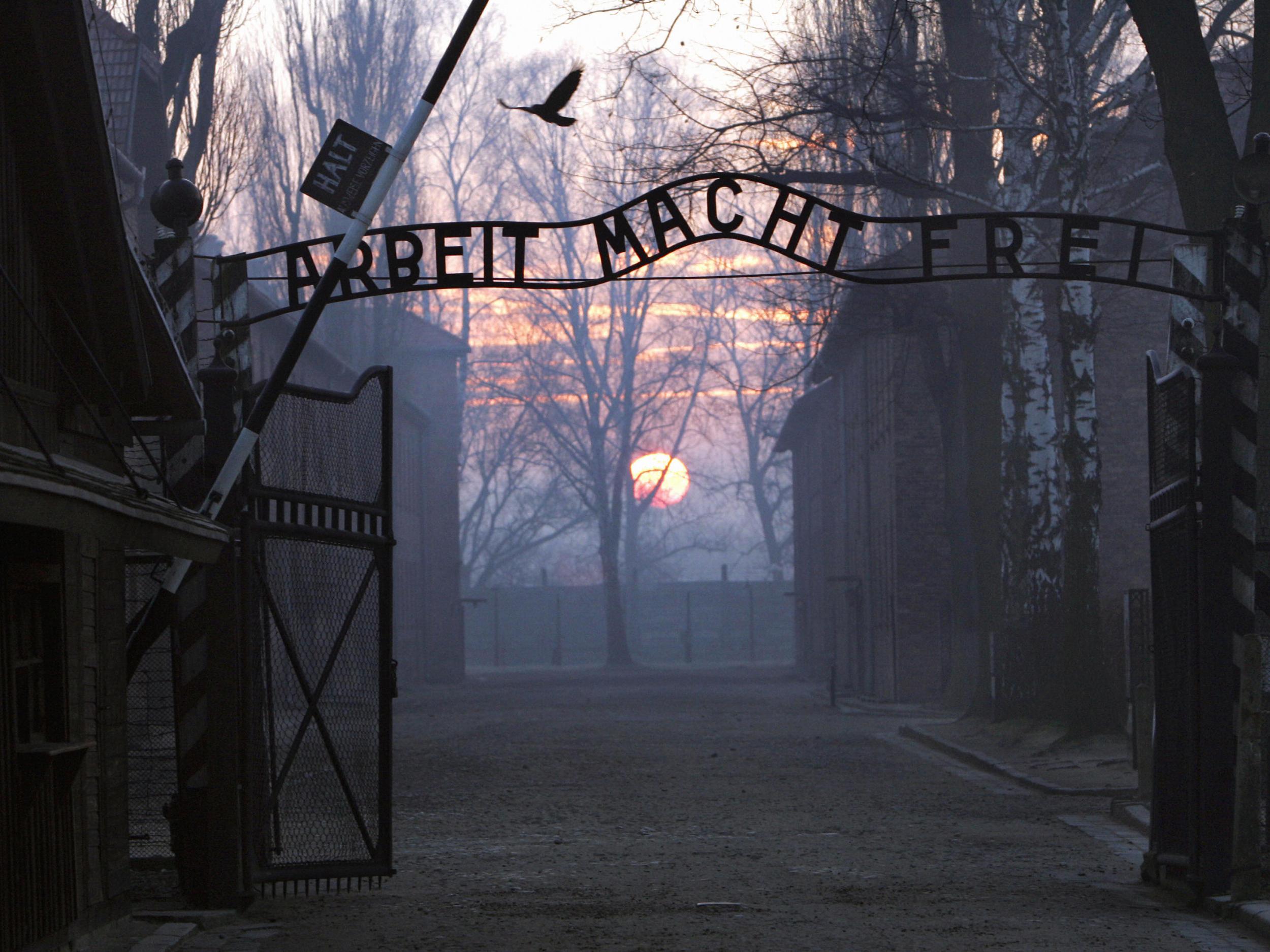 The entrance to the former Nazi concentration camp Auschwitz-Birkenau with the lettering 'Arbeit macht frei' ('Work makes you free')