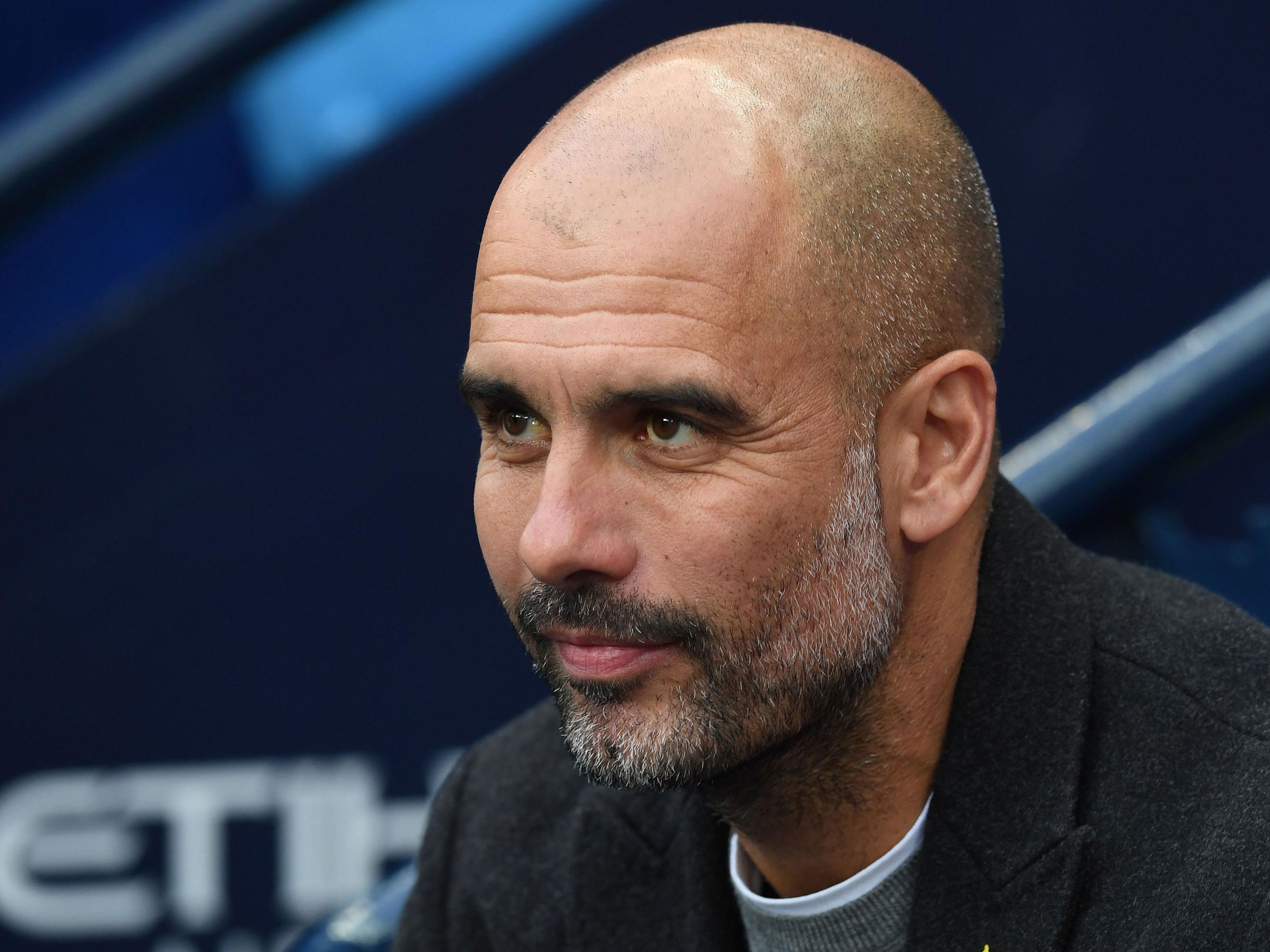 &#13;
Neville believes Guardiola would be the first to admits his side aren't great yet &#13;