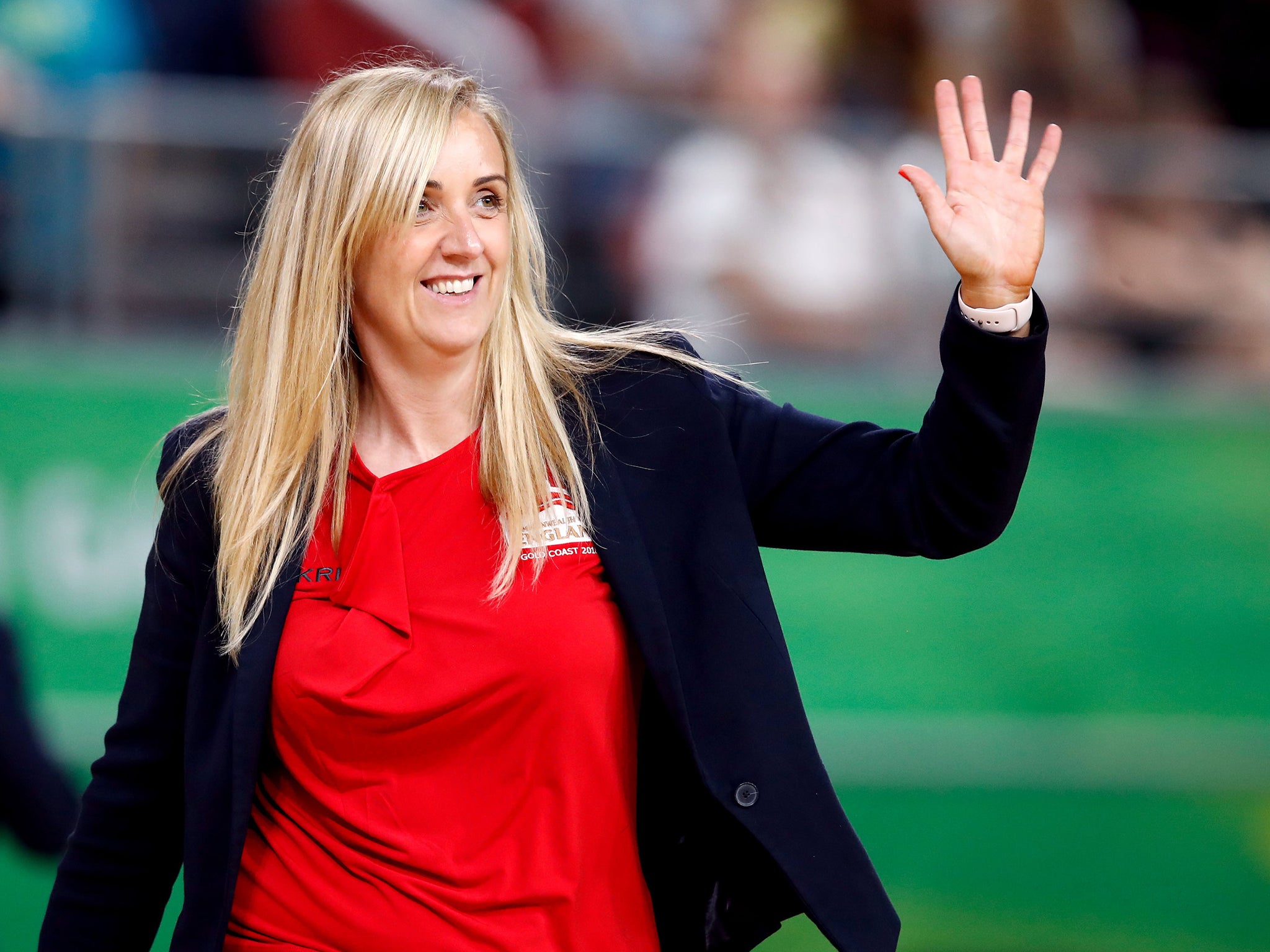 Tracey Neville waves to fans after England's Commonwealth Games victory over Jamaica