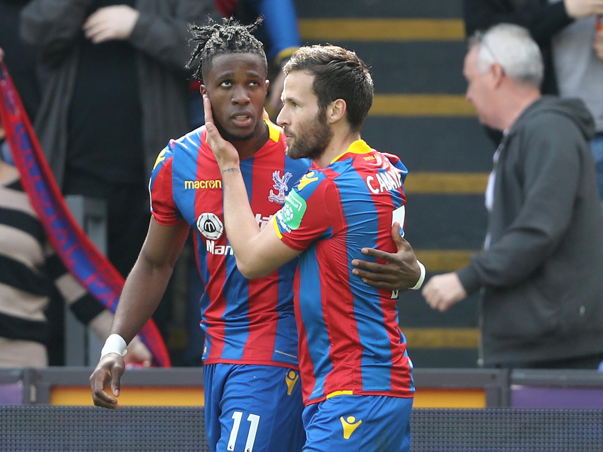 Wilfried Zaha celebrates scoring his second goal for Crystal Palace against Brighton