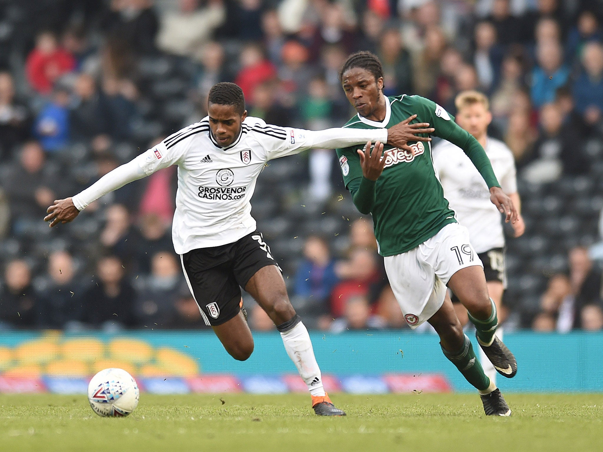 Ryan Sessegnon attempts to get away from Romaine Sawyers