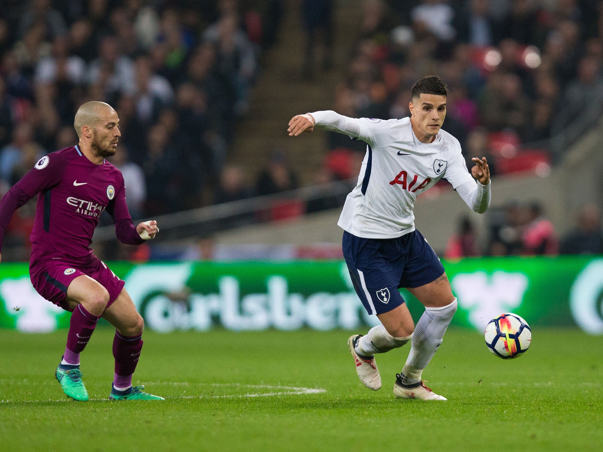 Erik Lamela races to get away from David Silva