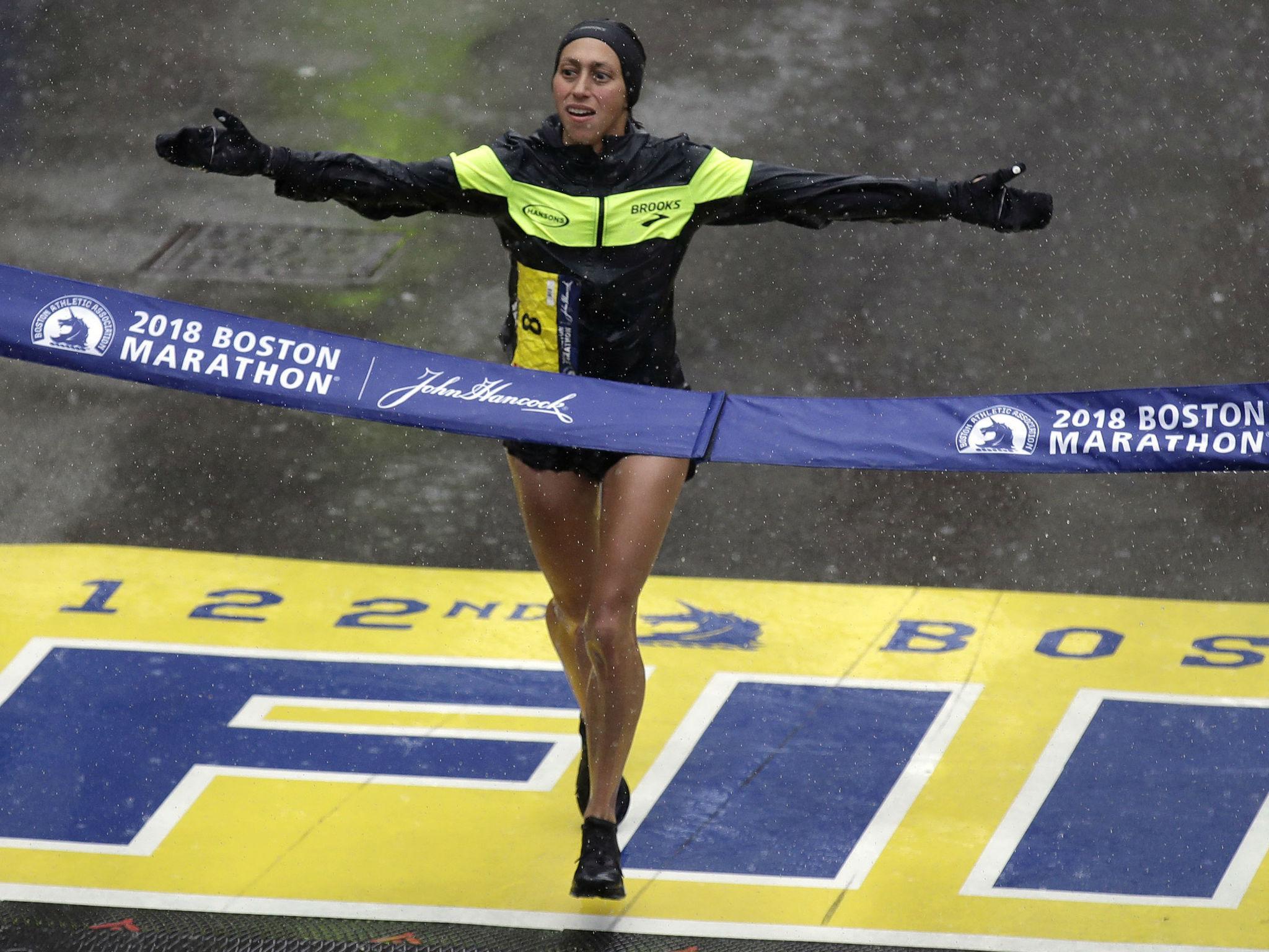 Ms Linden as she crossed the finish line in Boston Monday