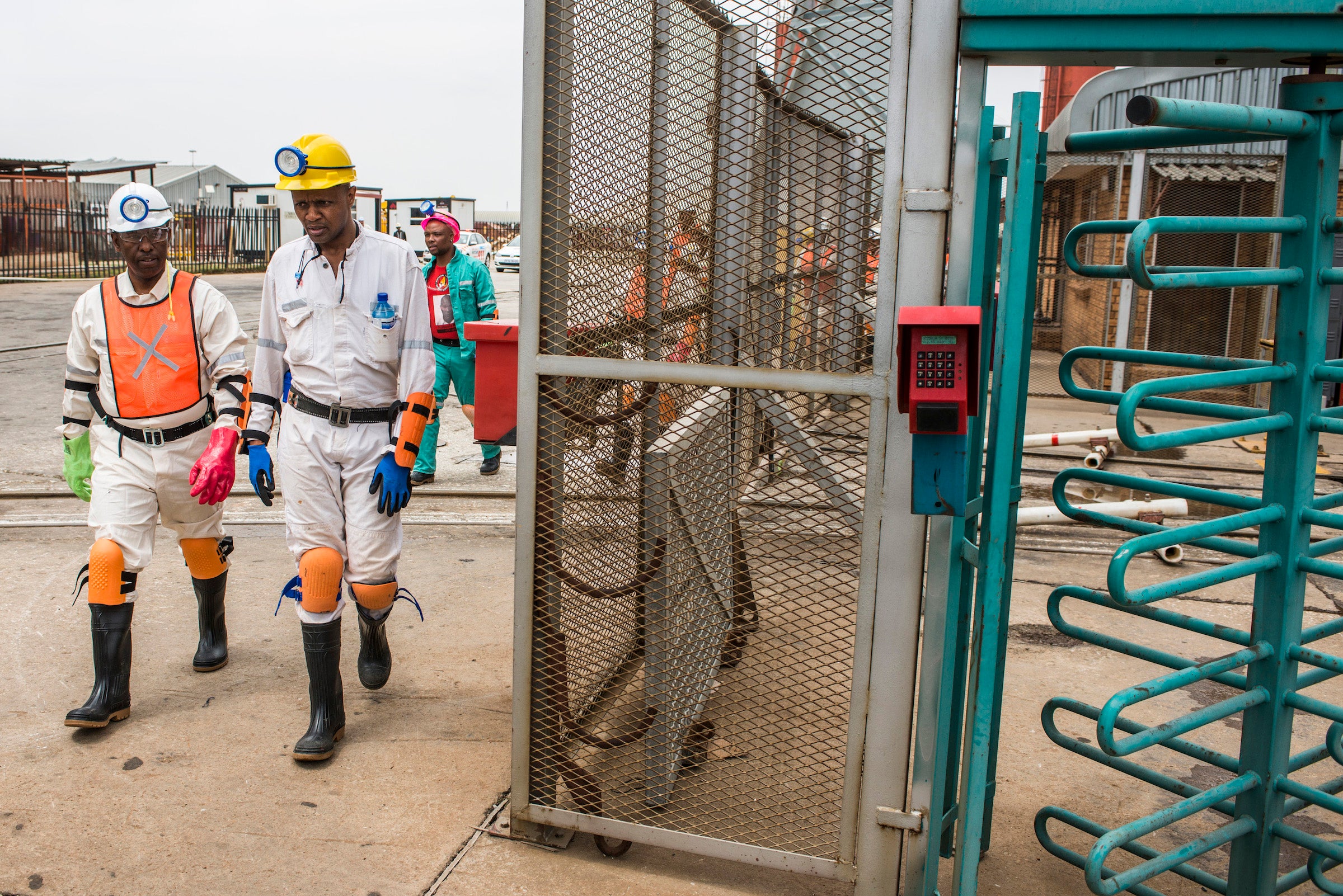 Minister of mineral resources, Mosebenzi Joseph Zwane (left), tours a gold mine in 2015