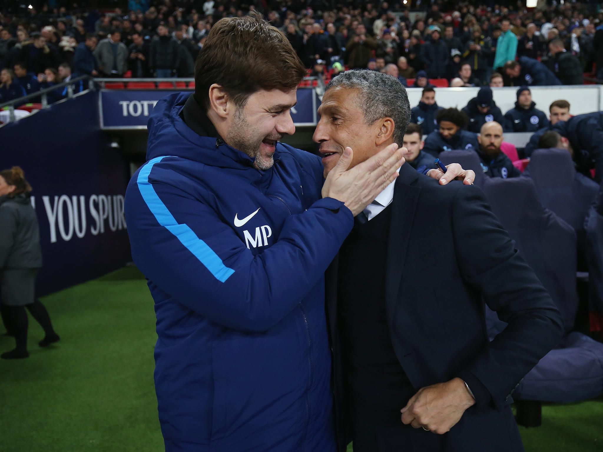 Mauricio Pochettino and Chris Hughton embrace ahead of their first meeting this season