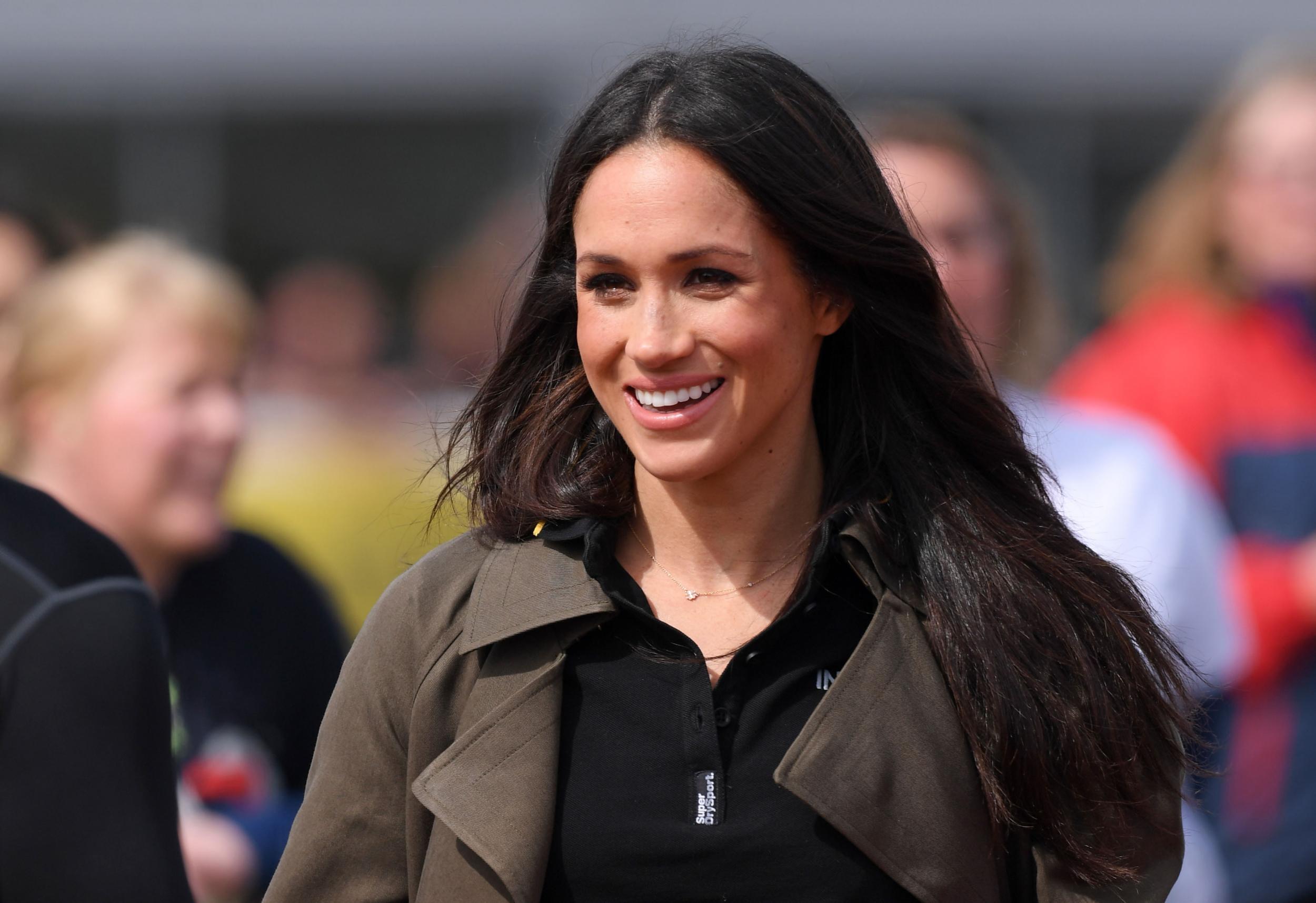 Just like the rest of us, Markle eats as she chops / Winnie Au