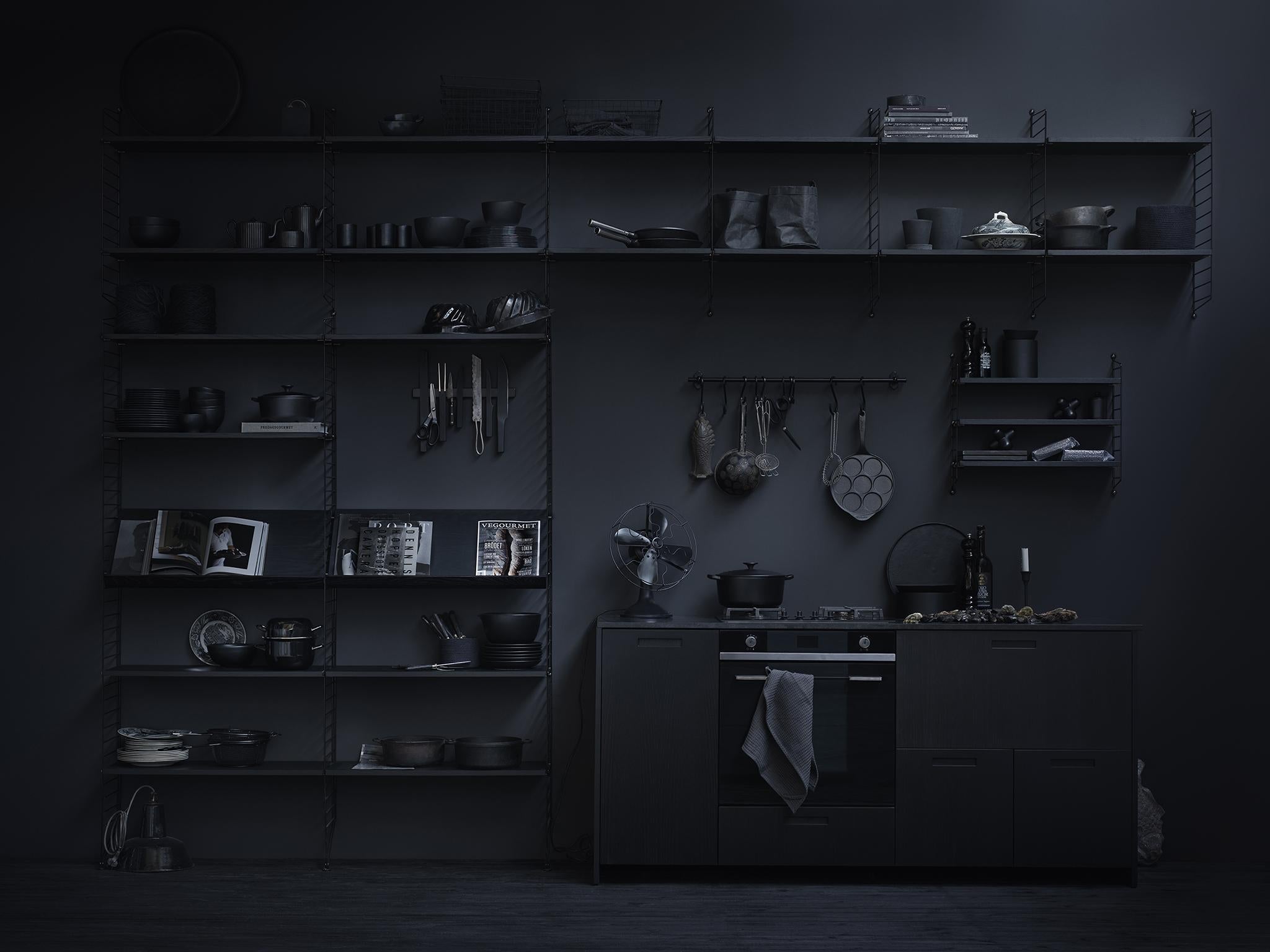 Black is the new... black? Clean lines and a dark angularity will give any kitchen a sense of cool