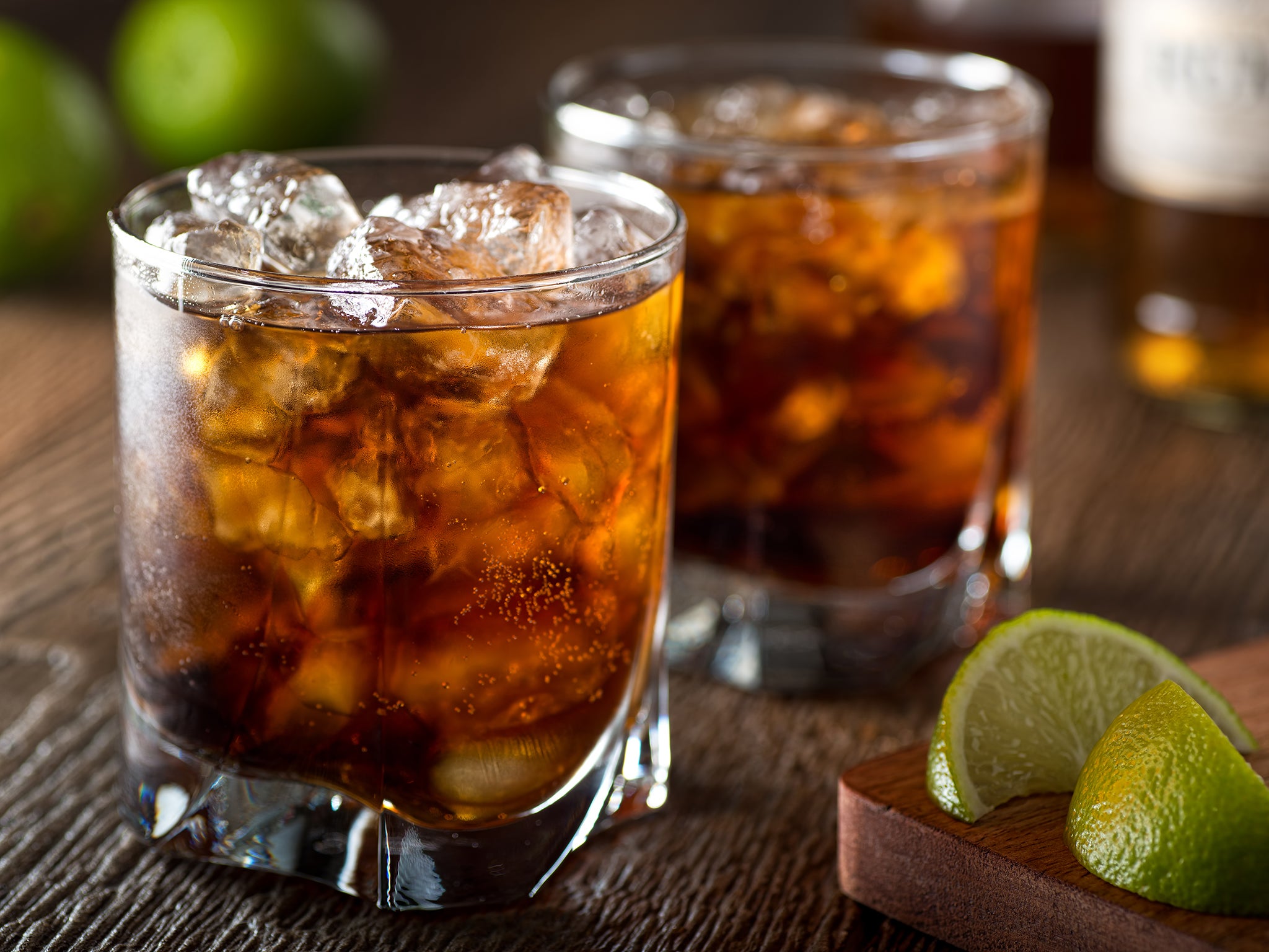 Rum and coke with lime and ice