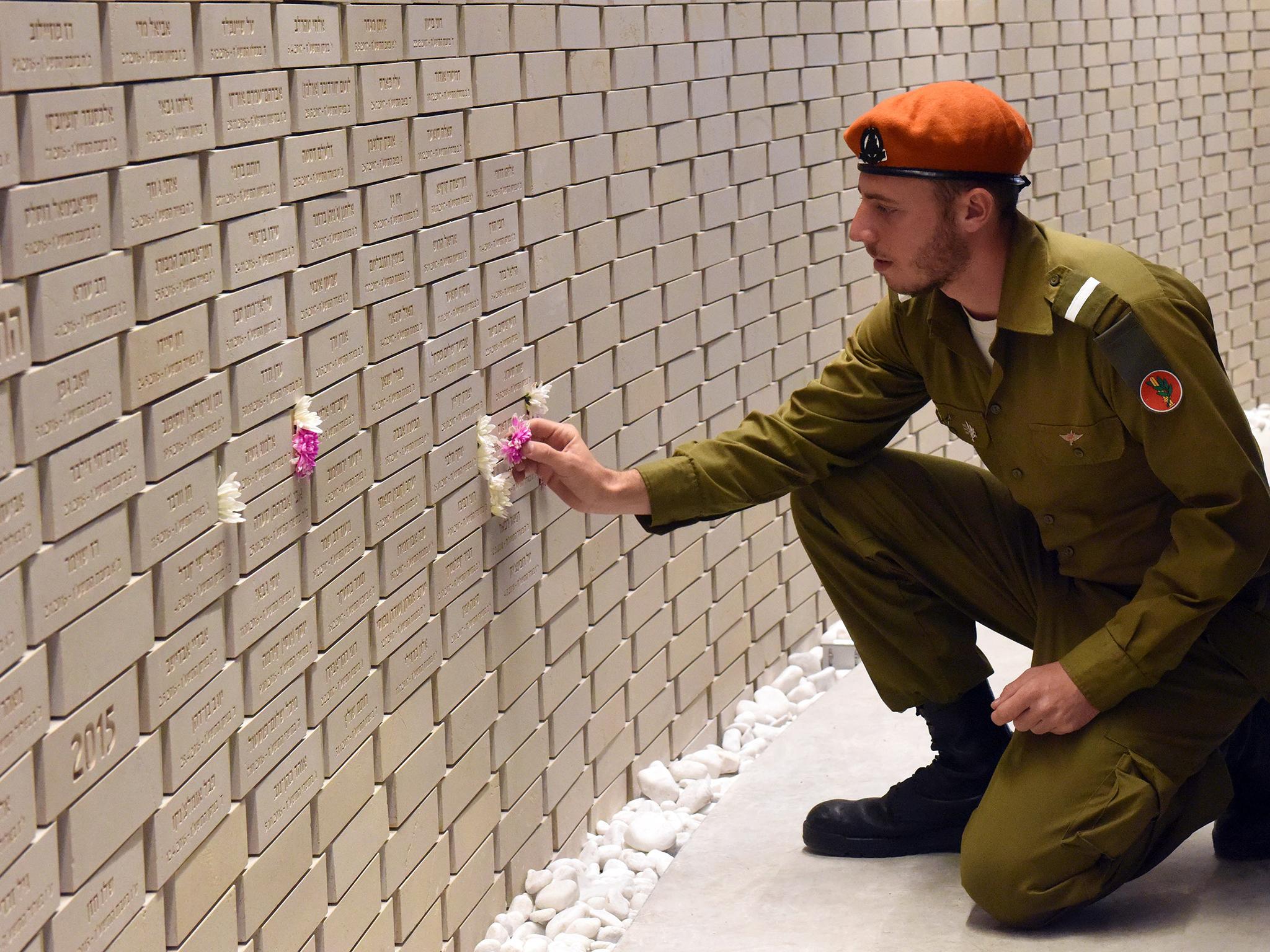 &#13;
The plaques are ordered by date rather than rank; privates take their place alongside generals and heroes (AFP/Getty)&#13;