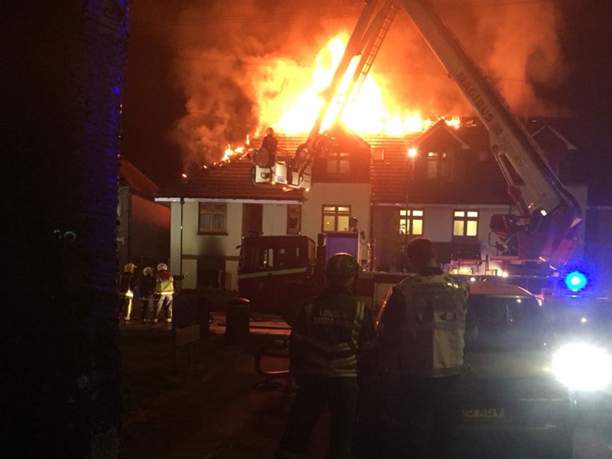 Pictures from the scene show flames pouring from the roof of the building