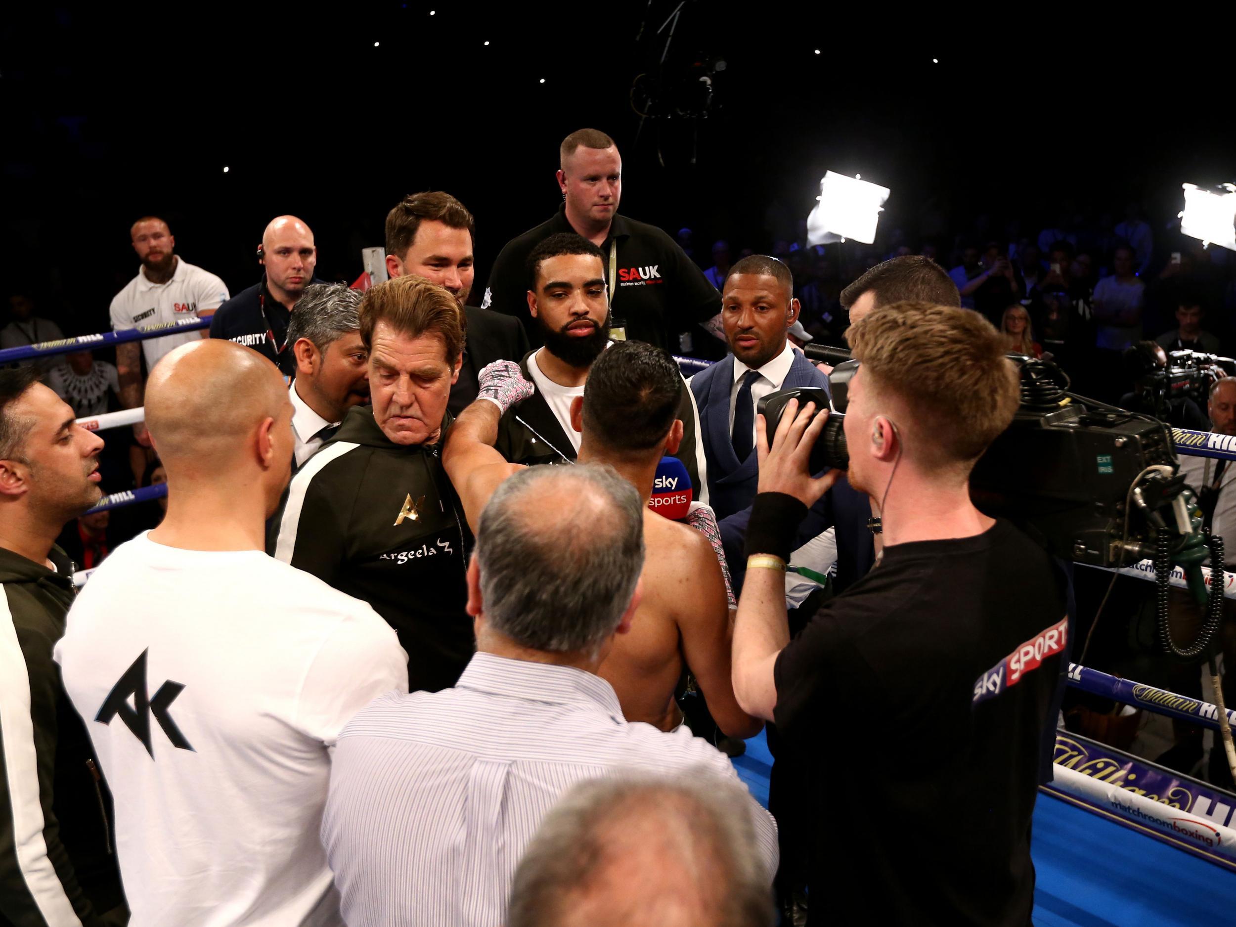 Brook and Khan met in the ring afterwards