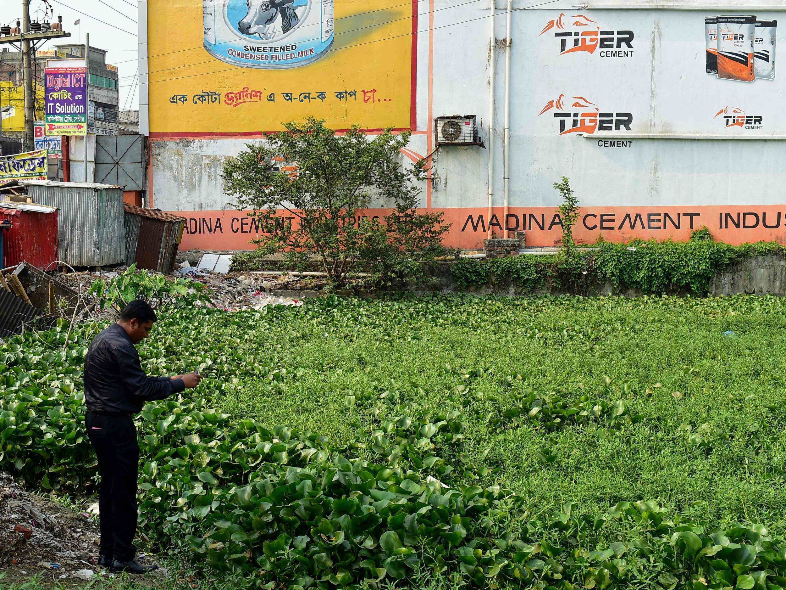 Whistleblower journalist Nasmul Huda returns to the site of the former garment factory, where 1,134 workers were killed when it fell in 2013