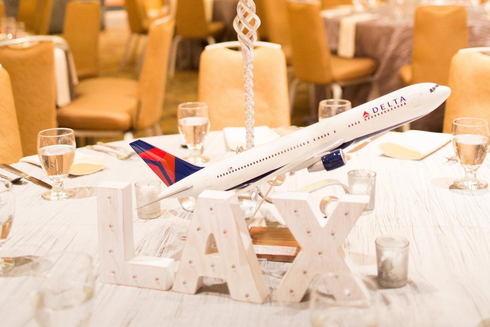Tables at the wedding were themed around cities meaningful to the couple