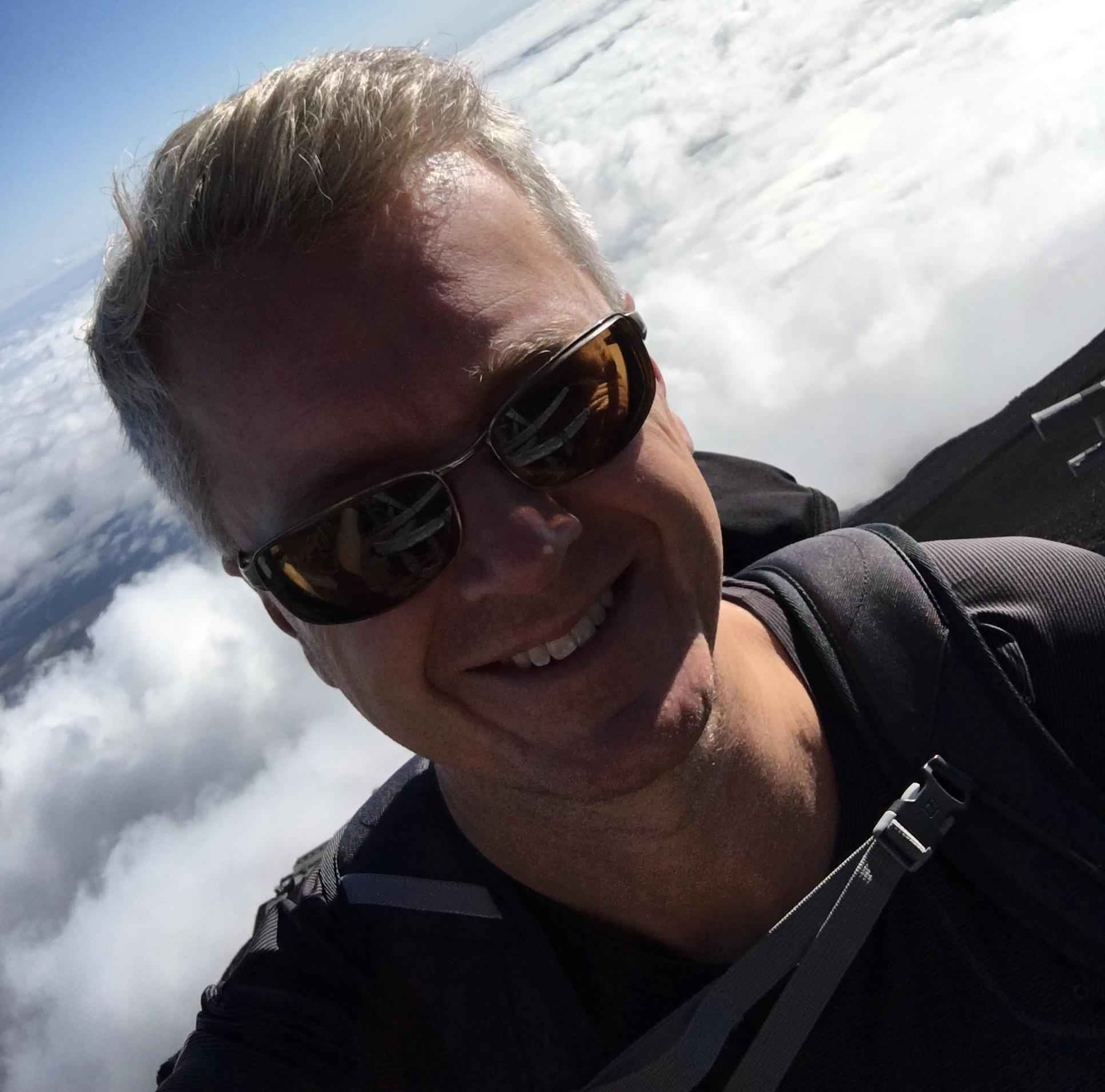 This portrait, taken on the top of Mount Fuji, is not an iPhone selfie. It was taken with a classic Nikon, and may well qualify as the first View From The Top image actually shot on the summit of a mountain