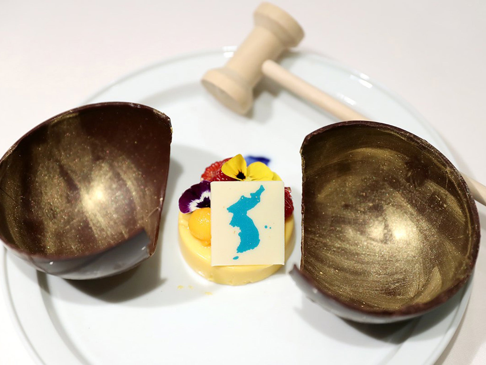 The dessert in question: a tropical mango mousse that features a map including islands contested by Japan