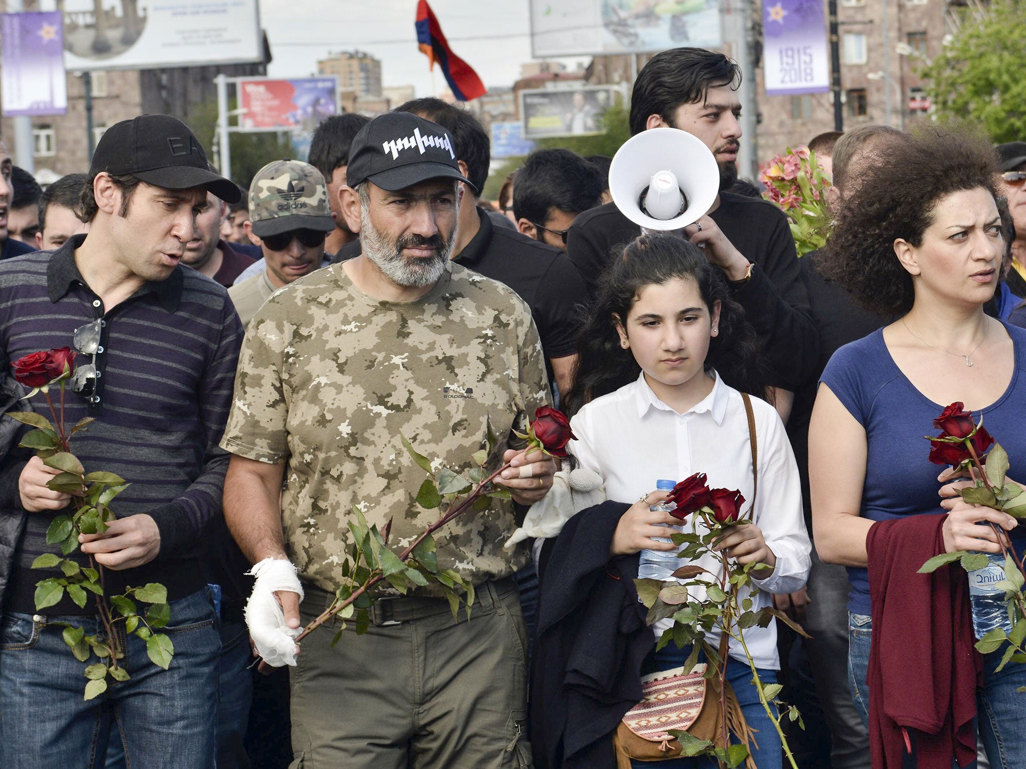 Armenian protest leader Nikol Pashinyan (second left) leads a march to the monument to the victims of the 1915 massacres in Yerevan