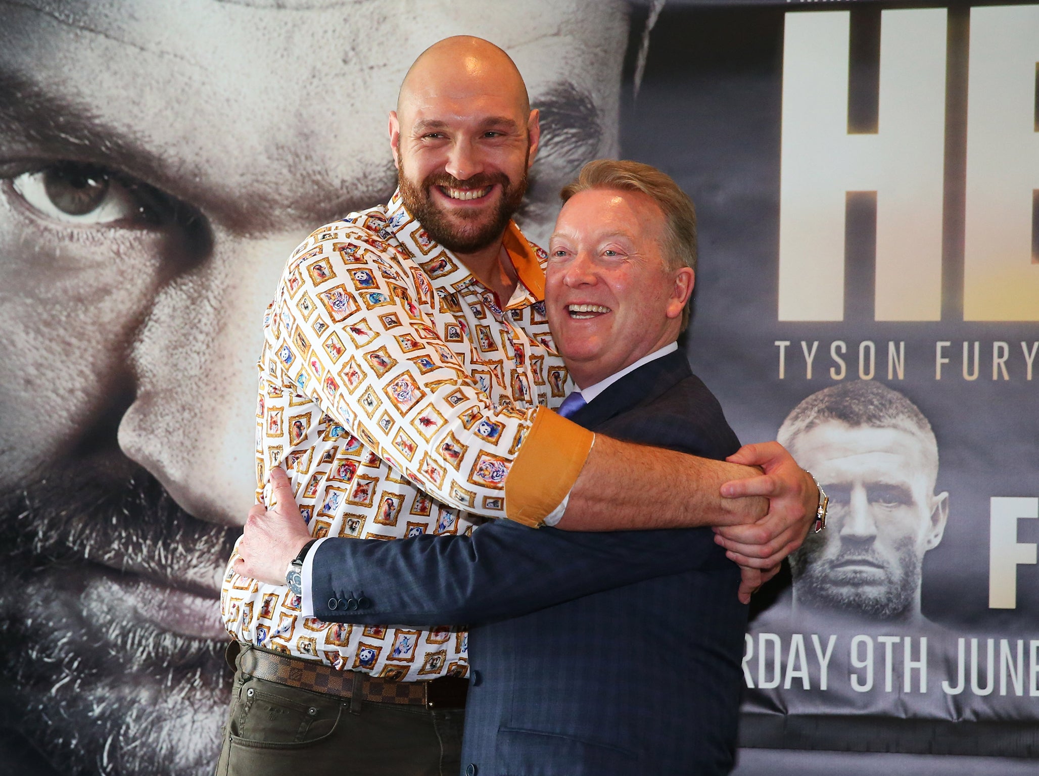 Tyson Fury and Frank Warren address the media