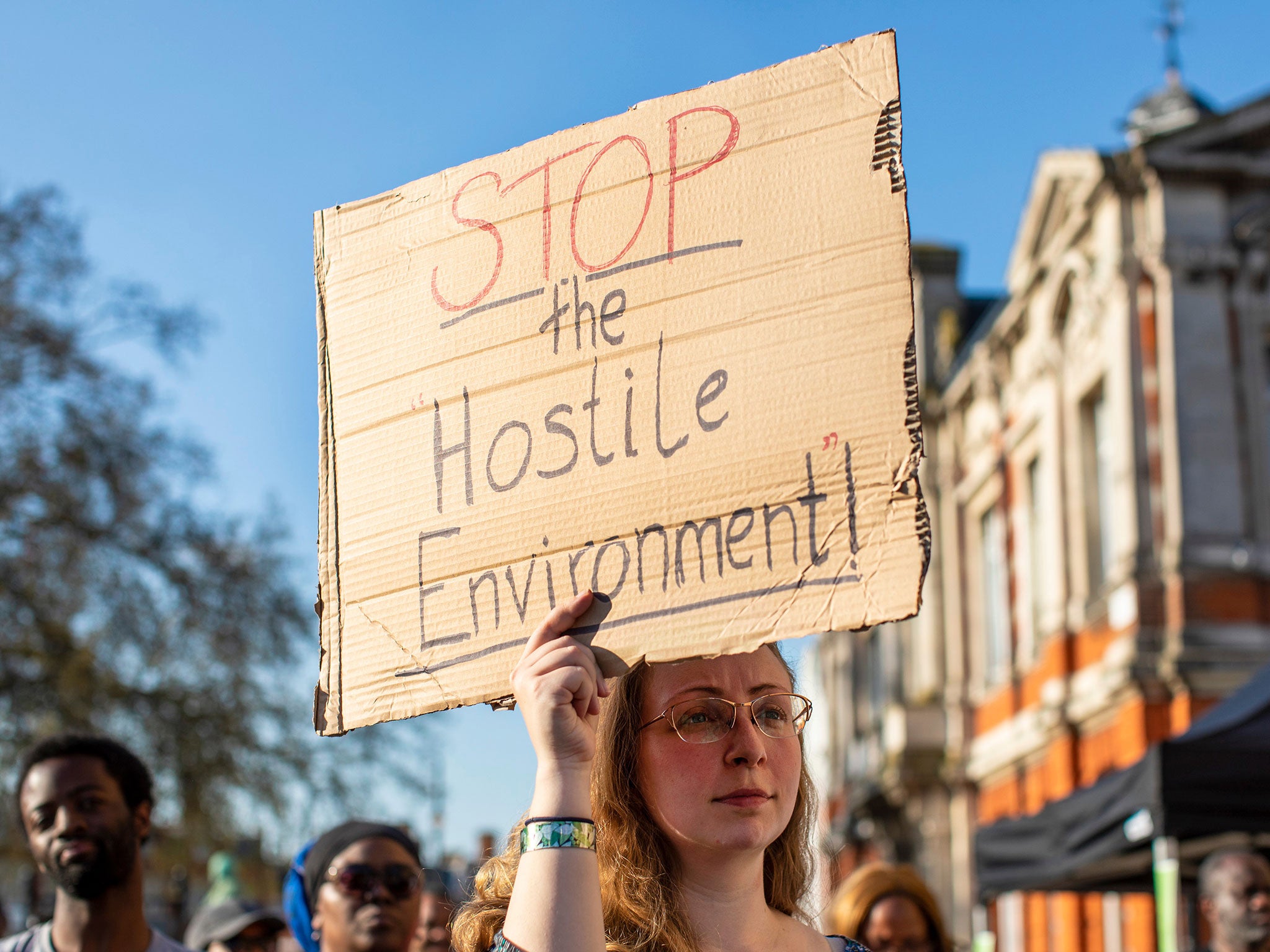 People gathered to protest in Brixton’s Windrush Square after migrants were threatened with deportation