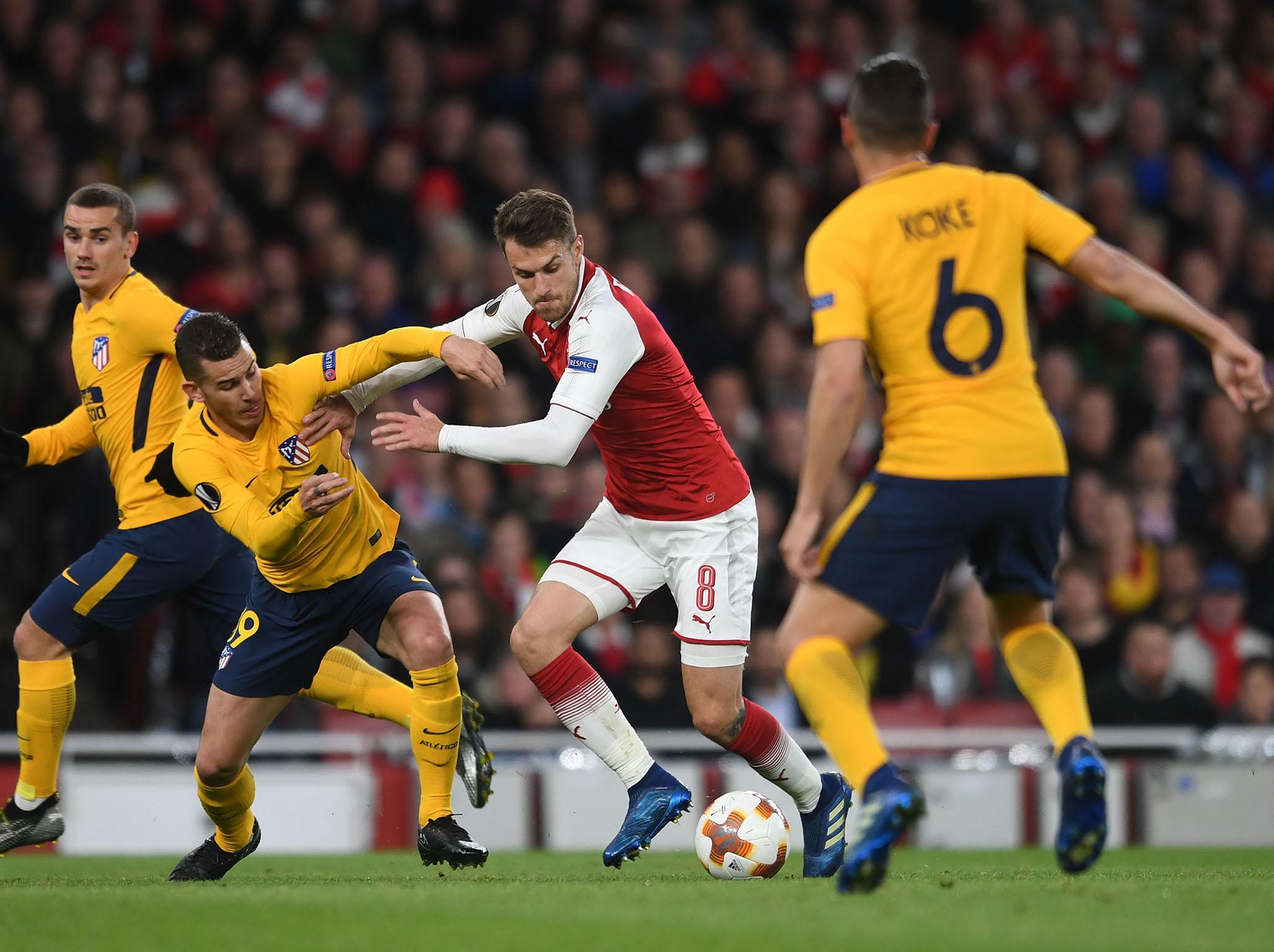 Atletico Madrid defended doggedly against Arsenal with 10 men