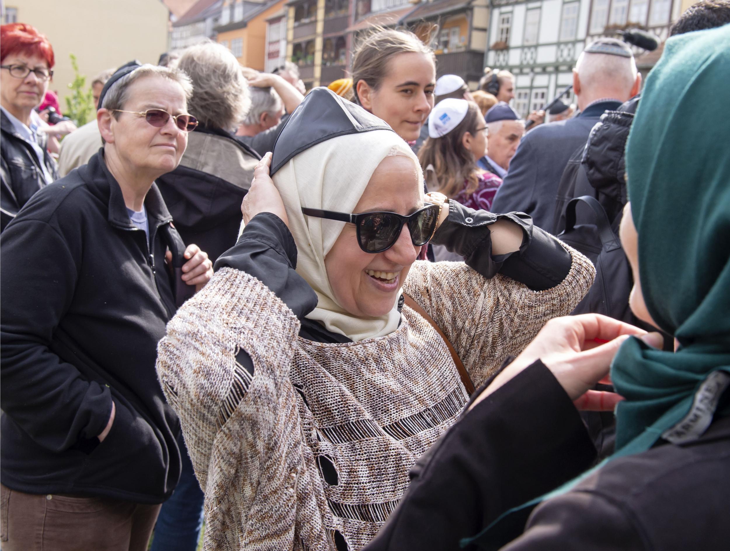 Samar Allaham wears the Kippah during a demonstration against antisemitism in Erfurt, Germany