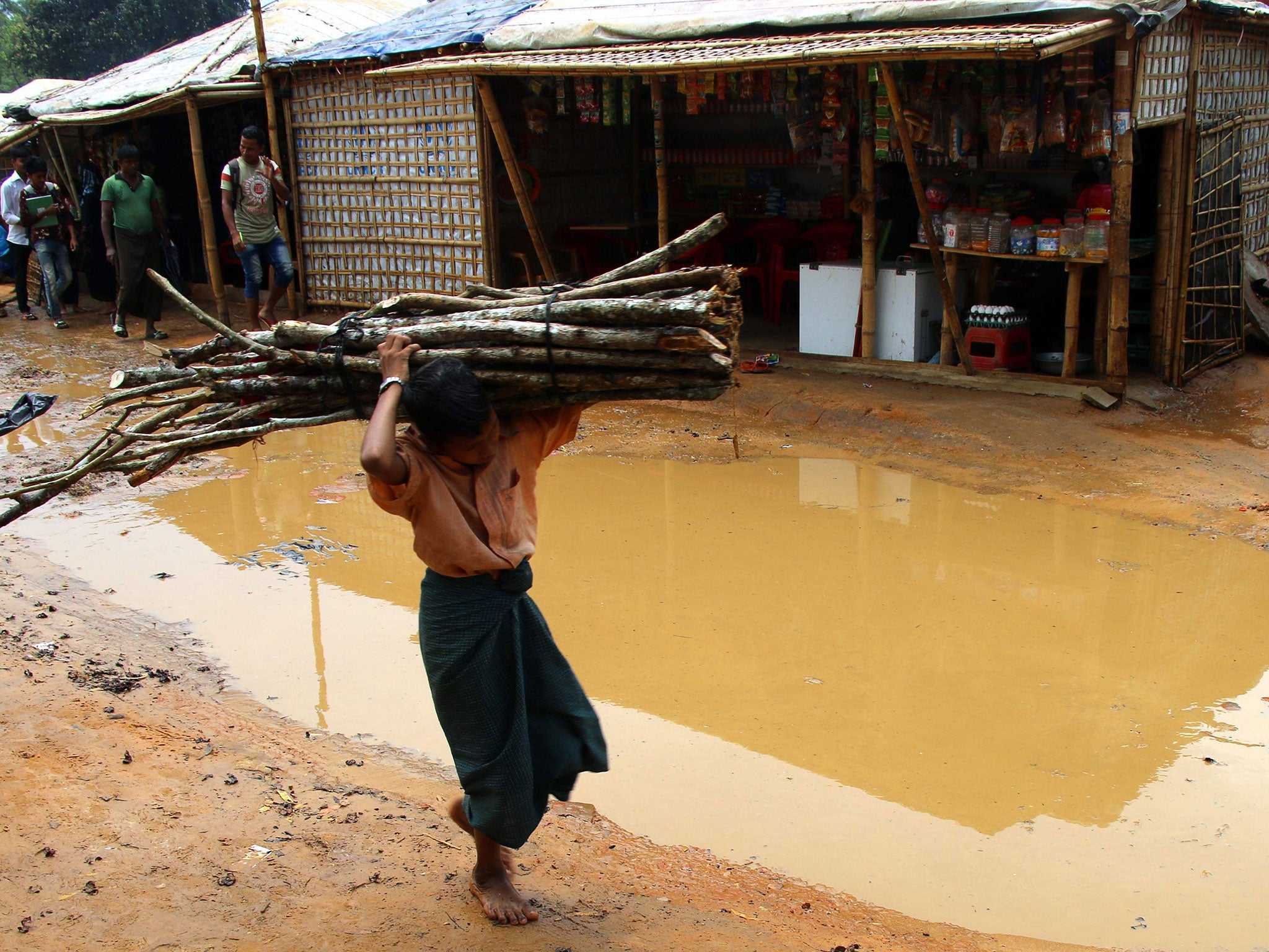 Water pools at a refugee camp for Rohingya refugees in Bangladesh's Cox's Bazar district following rains ahead of the monsoon season