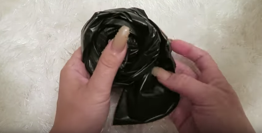 Scholl created roses out of the garbage bags (YouTube)