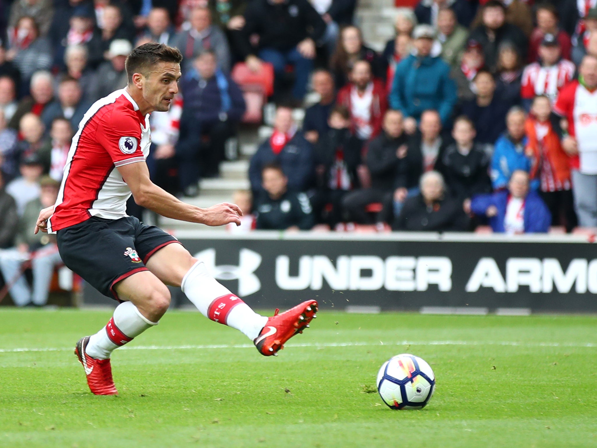 Dusan Tadic strokes home the opening goal for Southampton