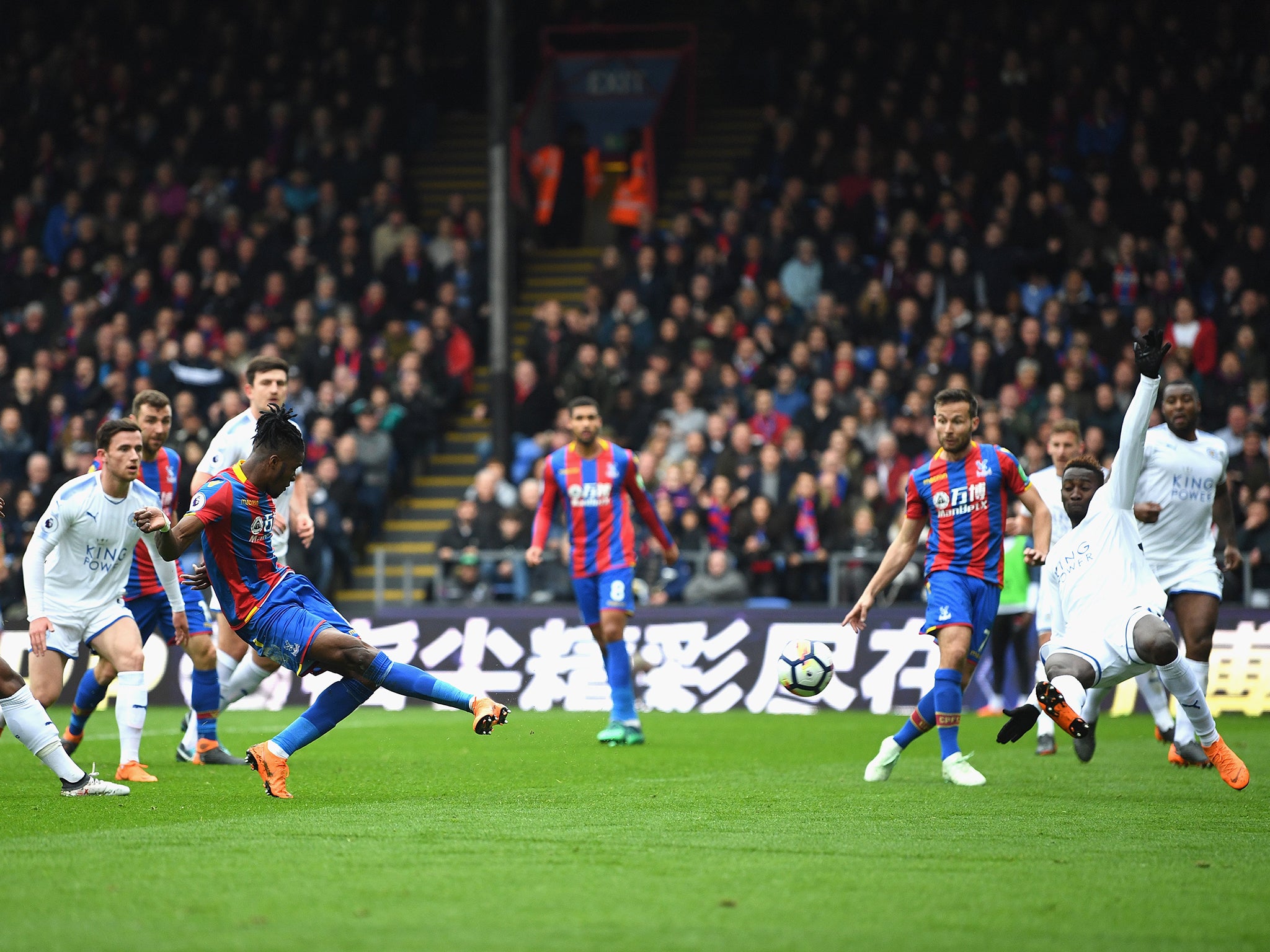 Wilfried Zaha scores the opening goal to spark the rout