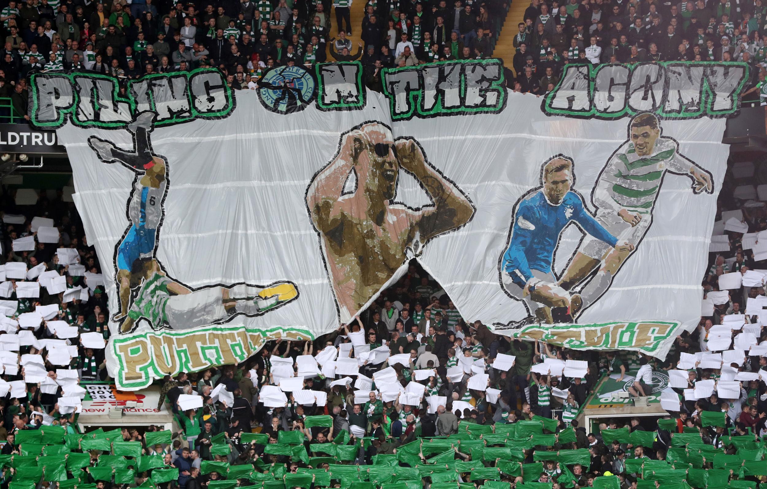 "Piling on the agony" read one Celtic banner