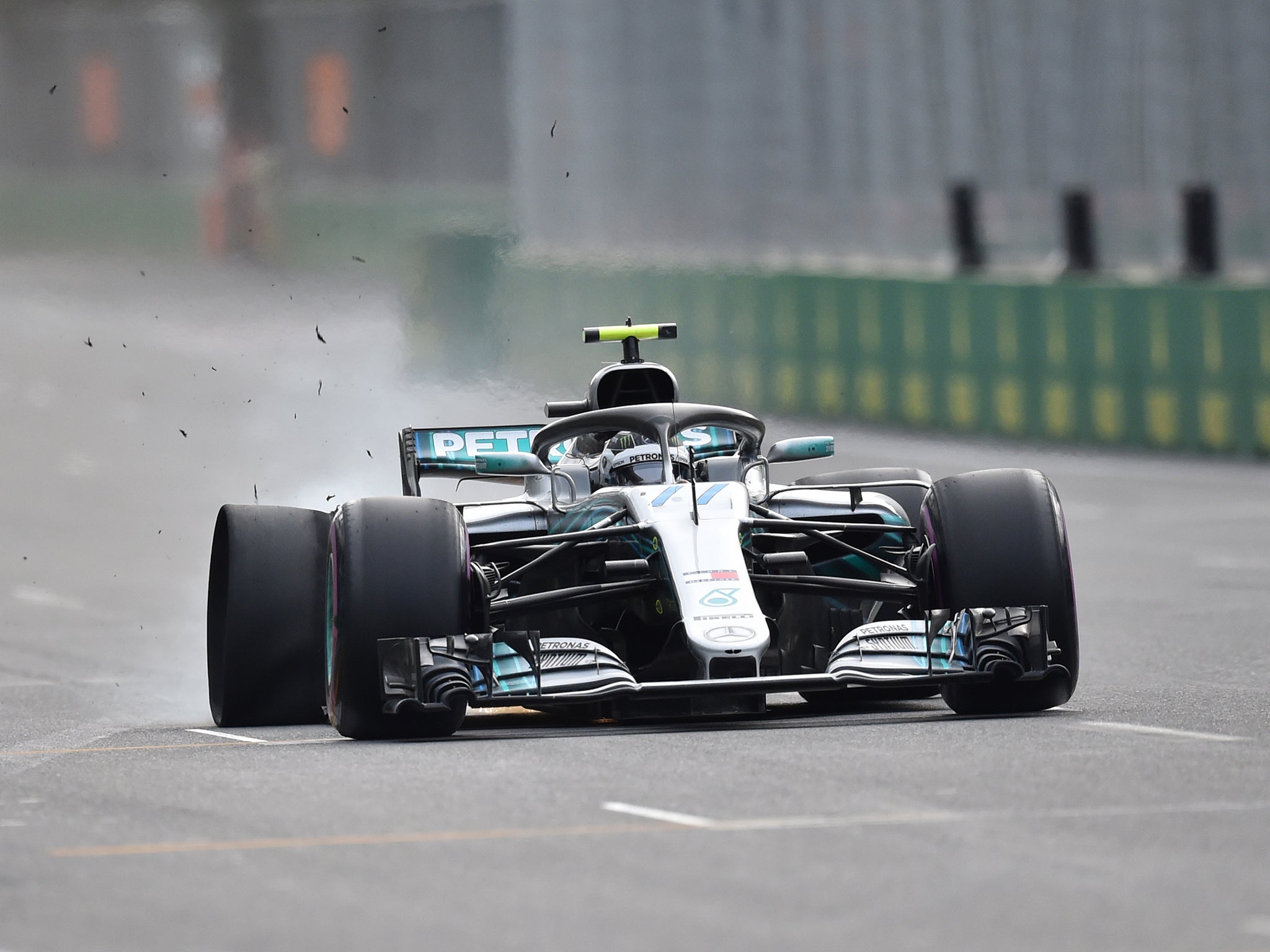 Valtteri Bottas suffered a read puncture two laps from the end while leading